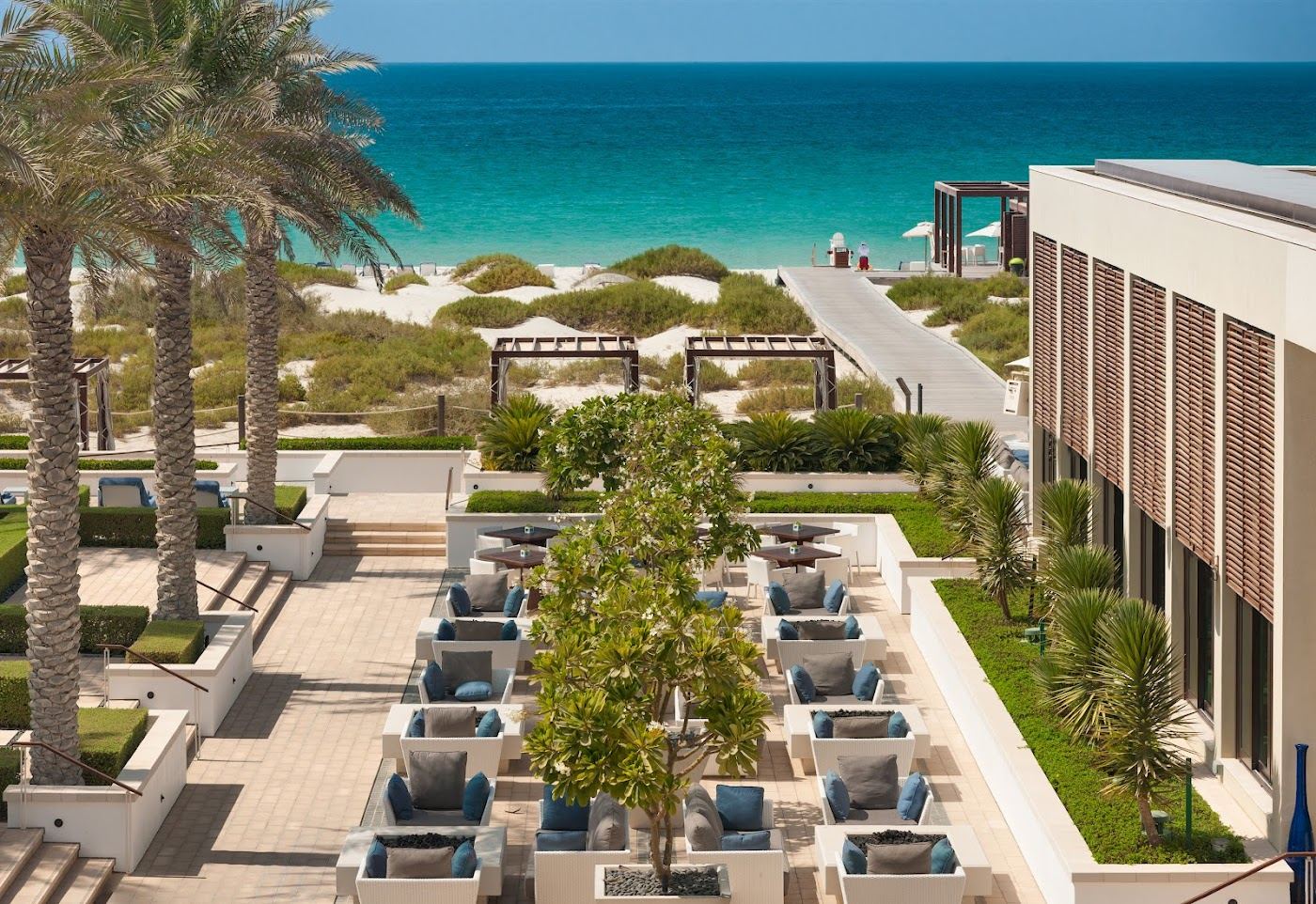 Pool and cabanas at a Saadiyat Island beach club in Abu Dhabi