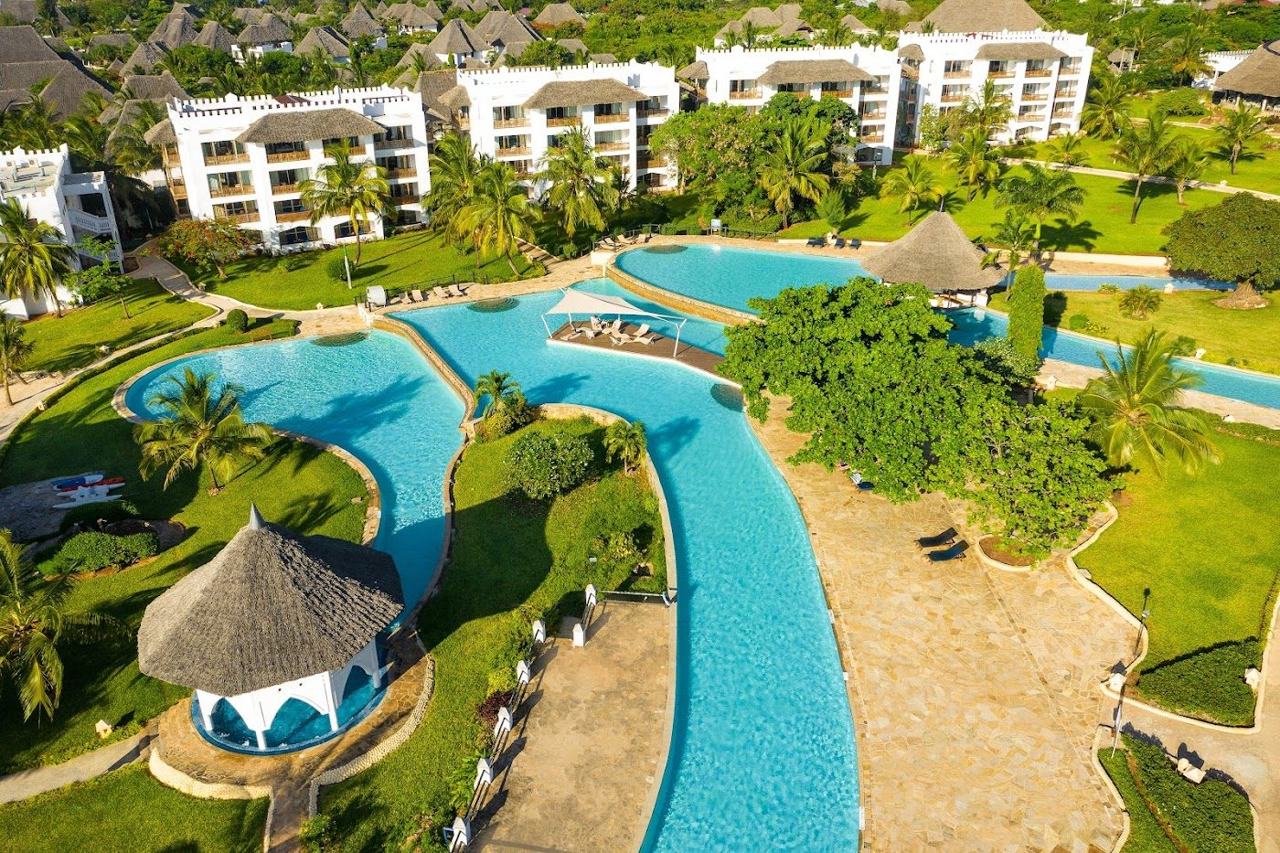 A boutique resort beach of white sand and turquoise water at a gentle price in Zanzibar