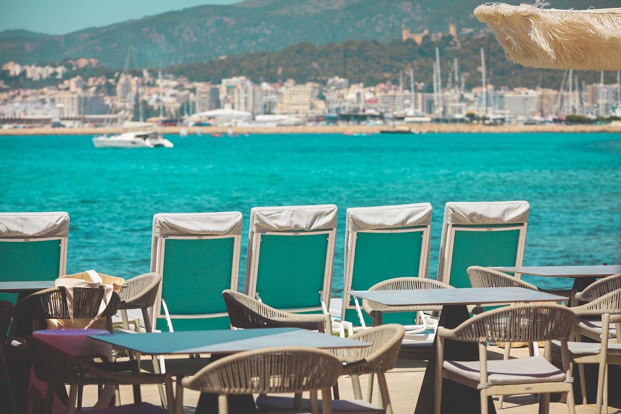 Sunbeds and terrace at Anima Beach on Can Pere Antoni city beach in Palma de Mallorca