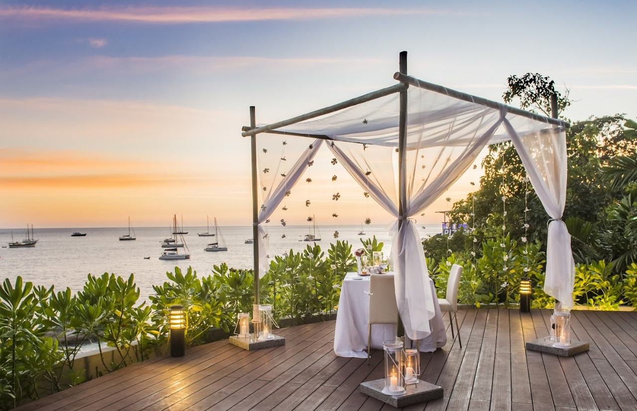 A casual beach restaurant in the trees beside the cove at Ao Sane in Phuket