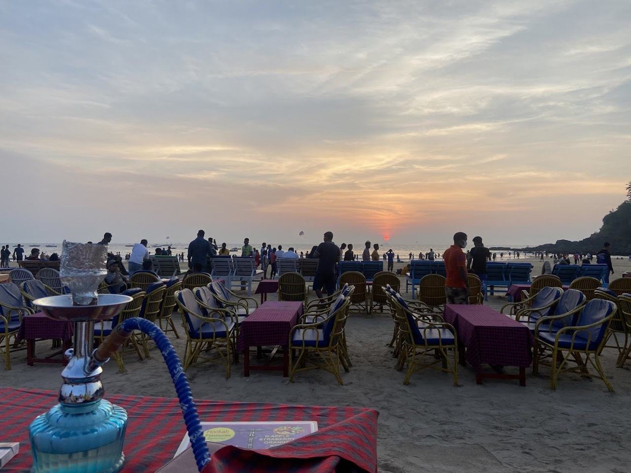 Baga Beach busy golden sand with water sports and shacks in North Goa