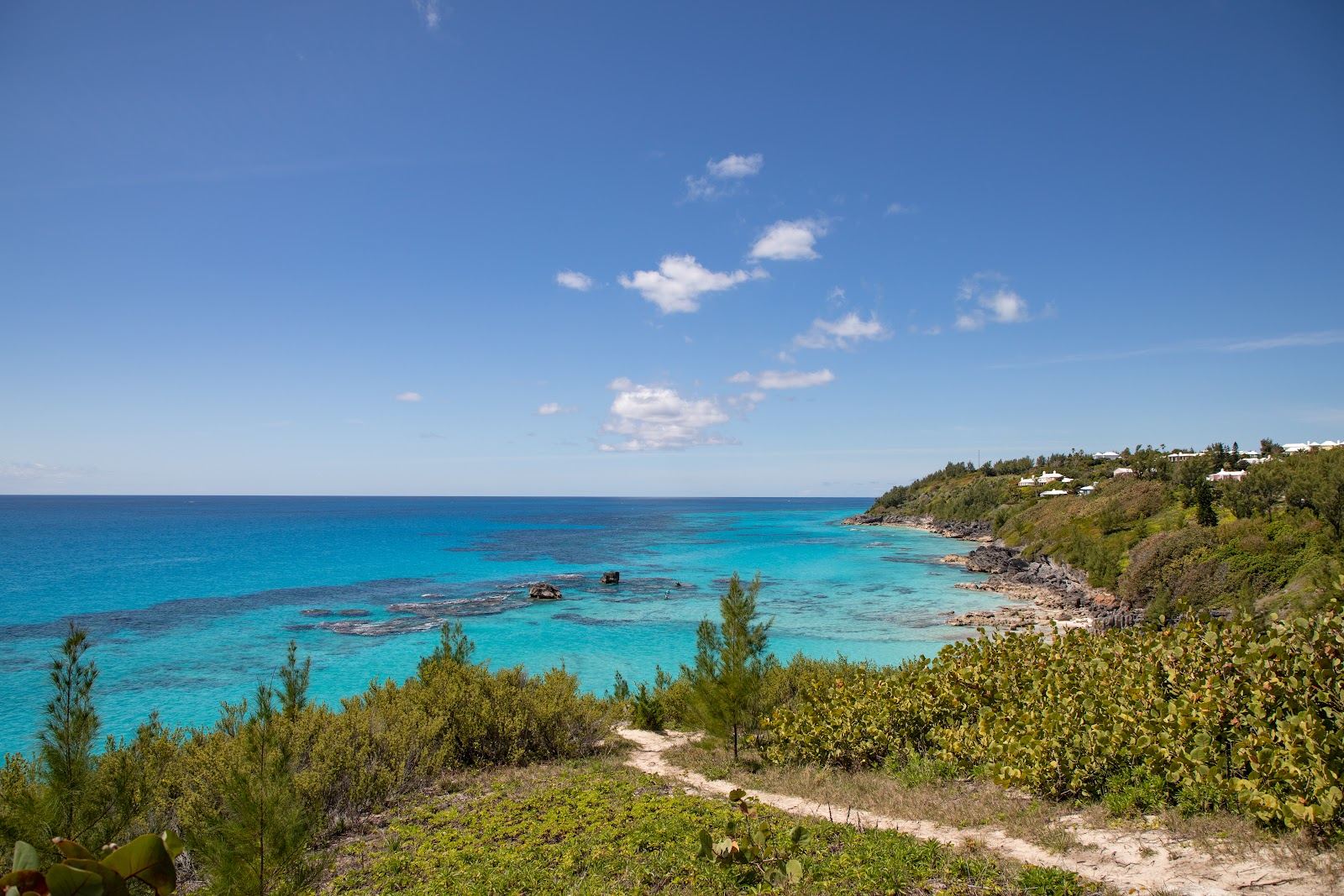 Clear turquoise water over a close reef at a south shore beach in Bermuda