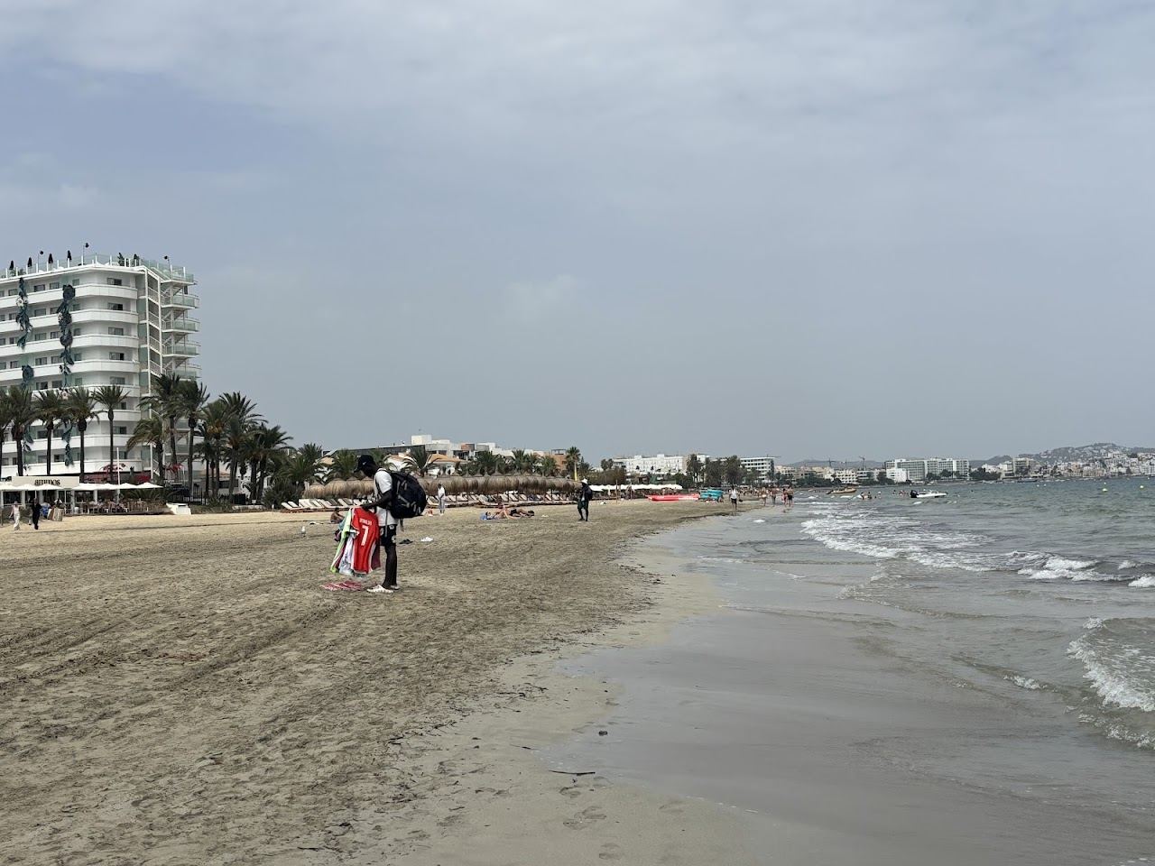 Long built up shore and daytime club crowd at Playa d'en Bossa in Ibiza