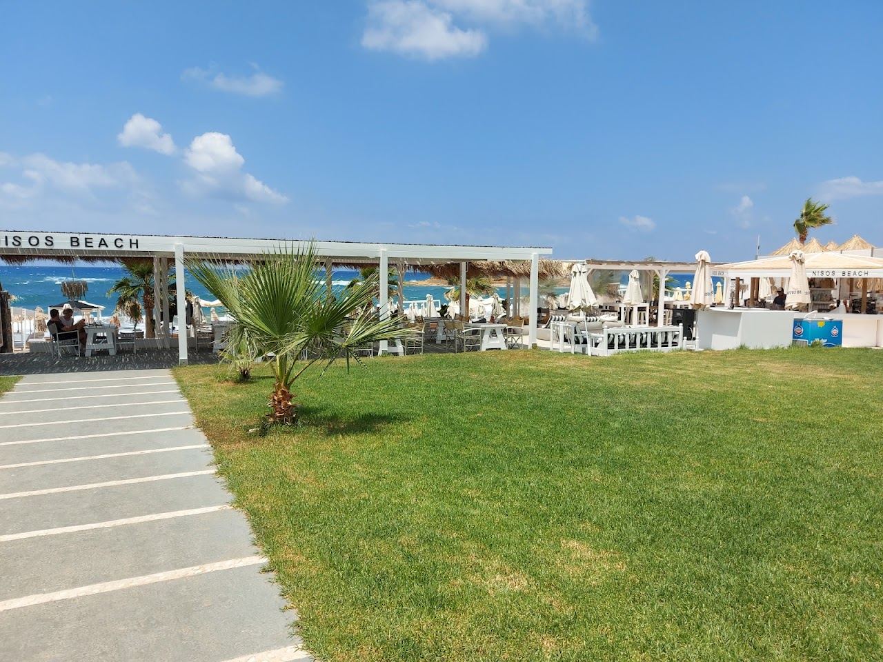 Cocktail and beach view at Bikini Beach Bar on the sand at Malia in Crete