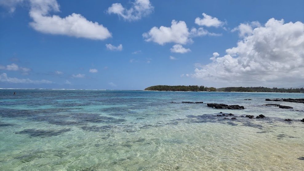 Blue Bay beach in Mauritius, calm clear water over a coral marine park near Mahebourg