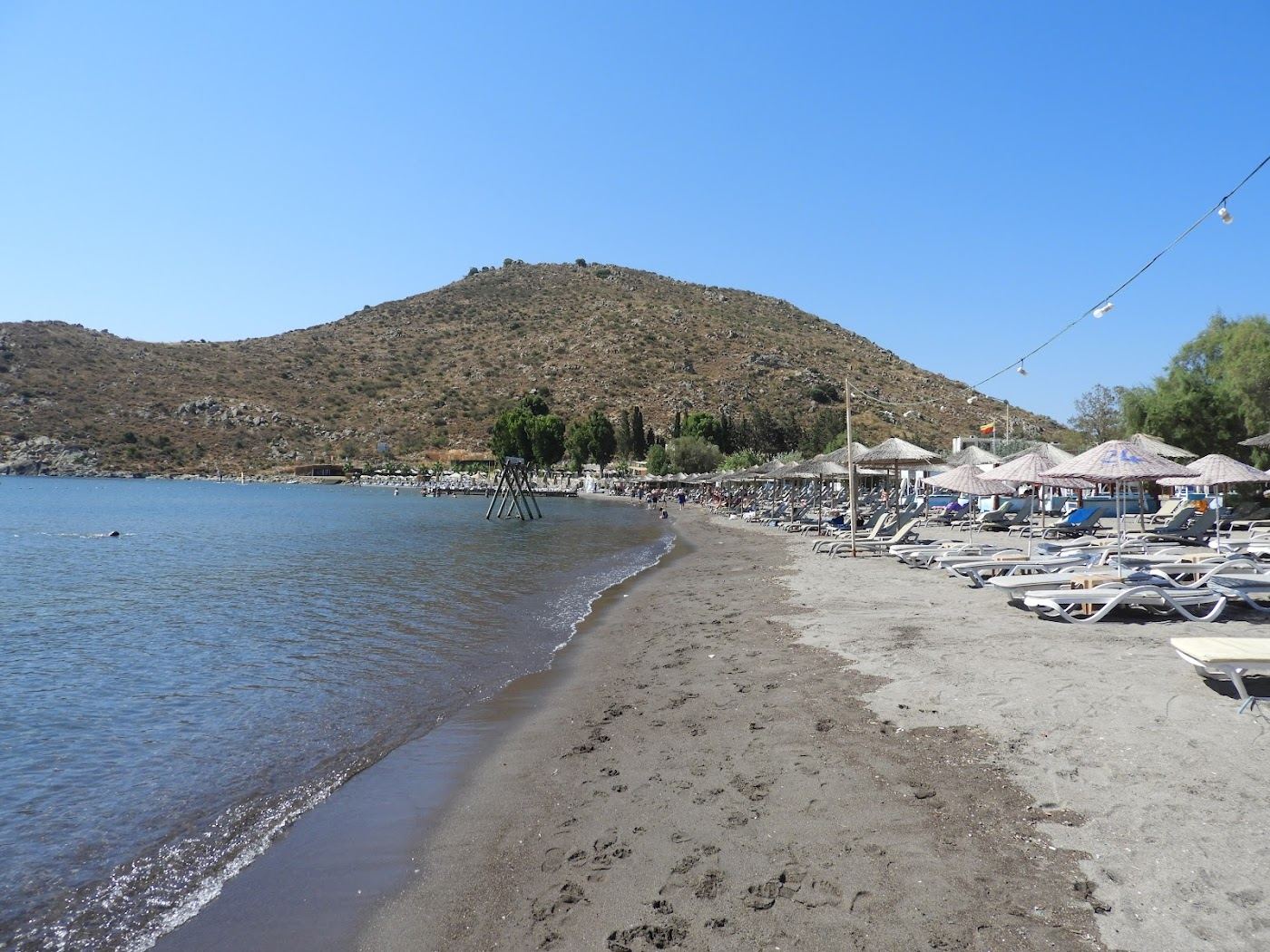 Quiet low key sandy cove with clear shallow water at Akyarlar on the southwest tip of Bodrum