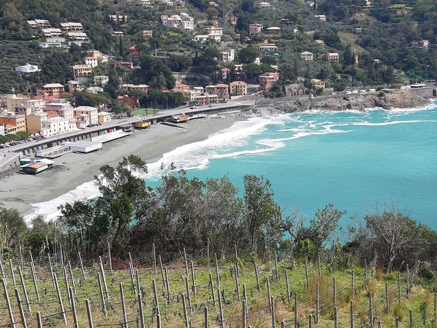 The relaxed seafront and village of Bonassola above its sheltered Liguria beach