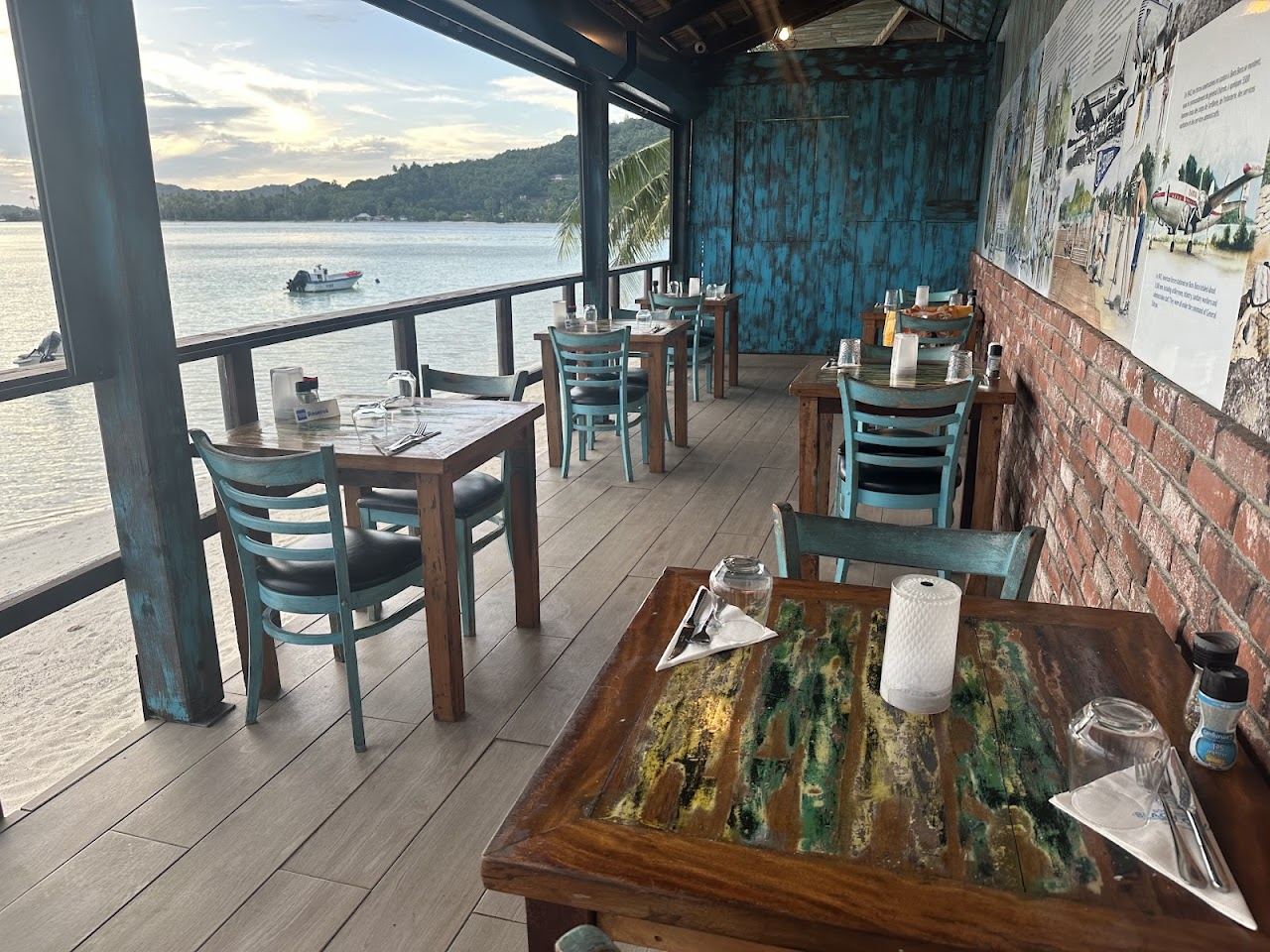 Lagoonfront dining terrace of Bora Bora Beach Club looking over the turquoise water at Matira Beach