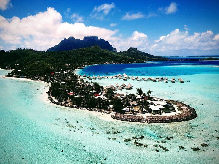The public white sand of Matira Beach at the southern tip of Bora Bora