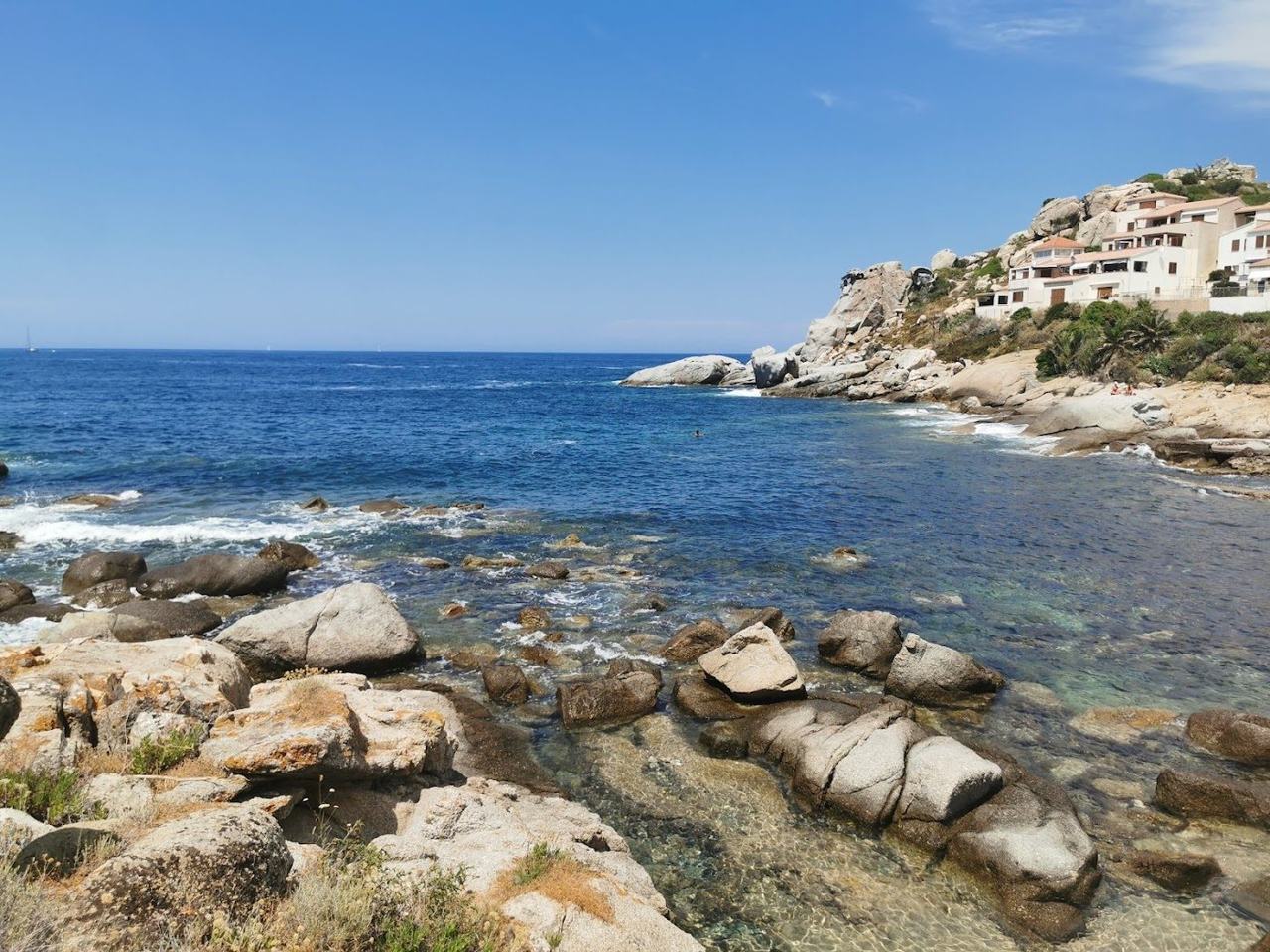 The long pale sand and sheltered bay below the Genoese citadel at Calvi in the Balagne of Corsica