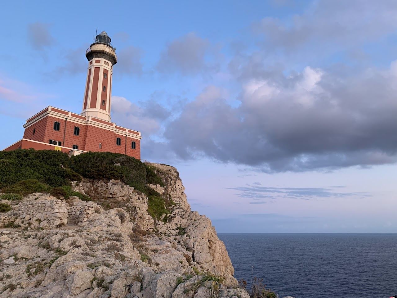 West facing rocks and golden light at Punta Carena lighthouse in Capri