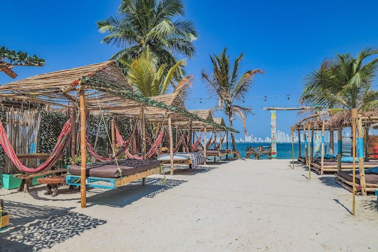 Loungers and calm water at a beach club on Tierra Bomba near Cartagena