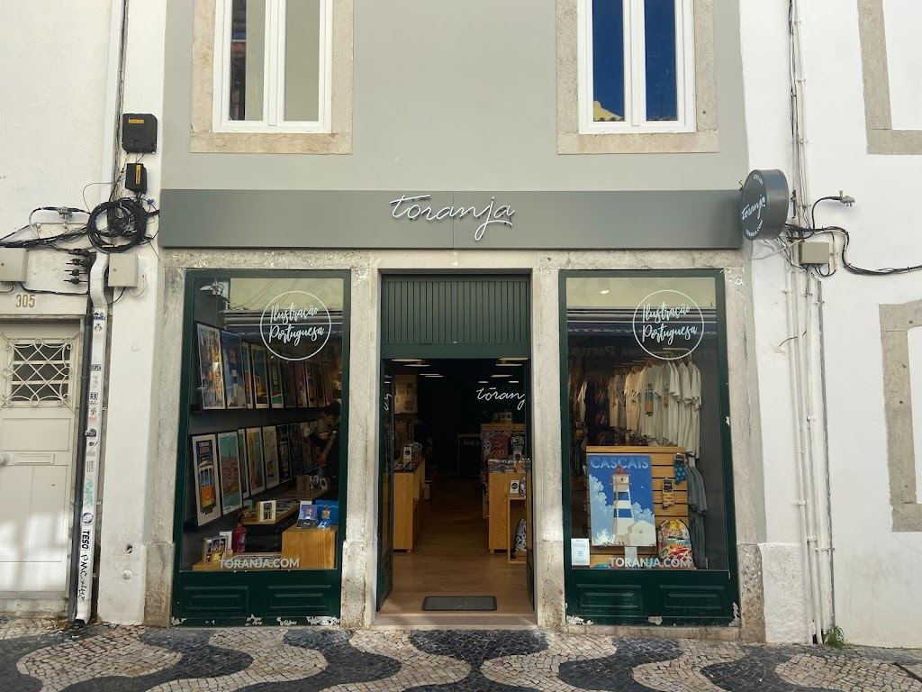 Cafes and the old town streets just above Praia da Rainha in Cascais