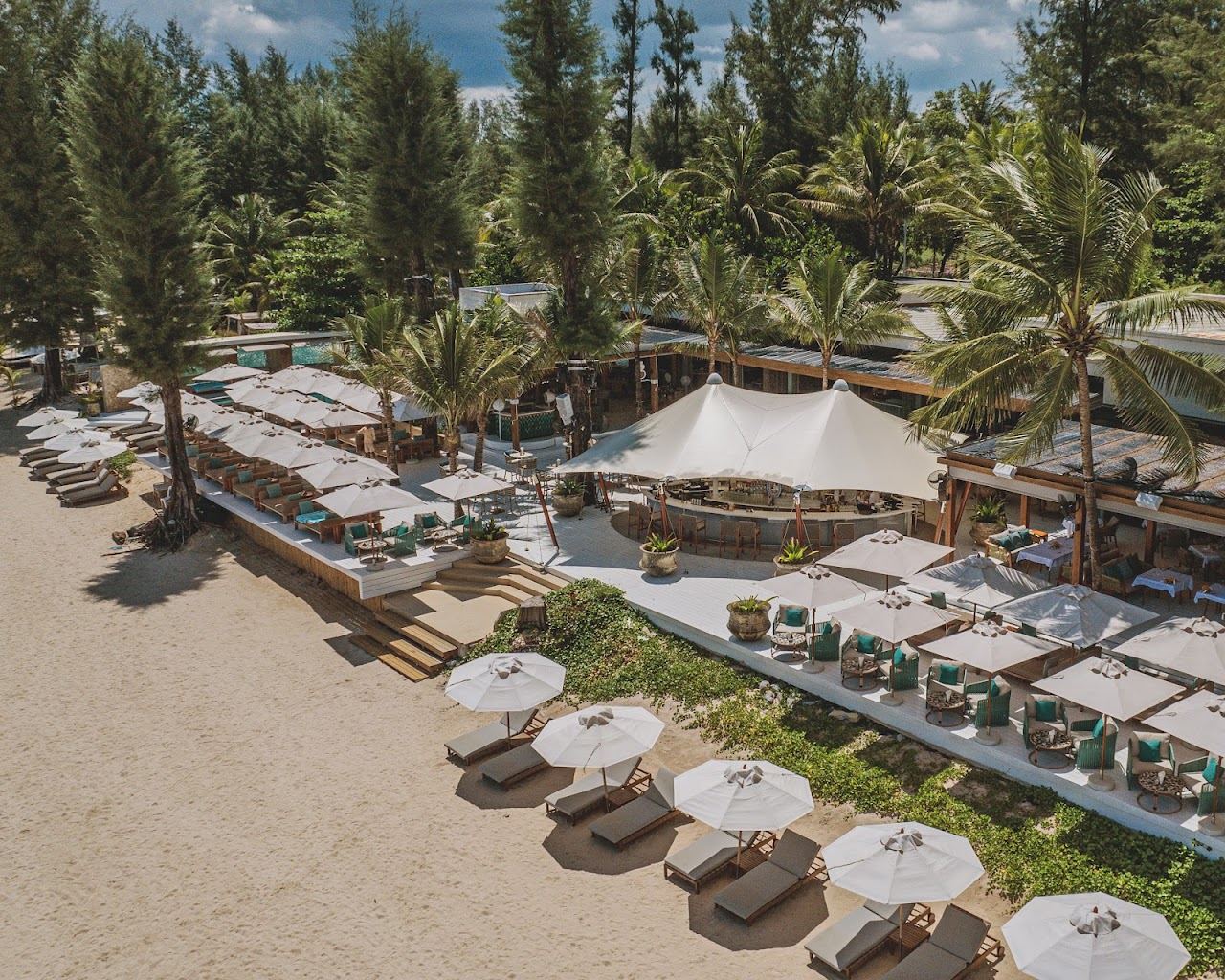 Pool, cabanas and daybeds in the grounds of Catch Beach Club on Bang Tao