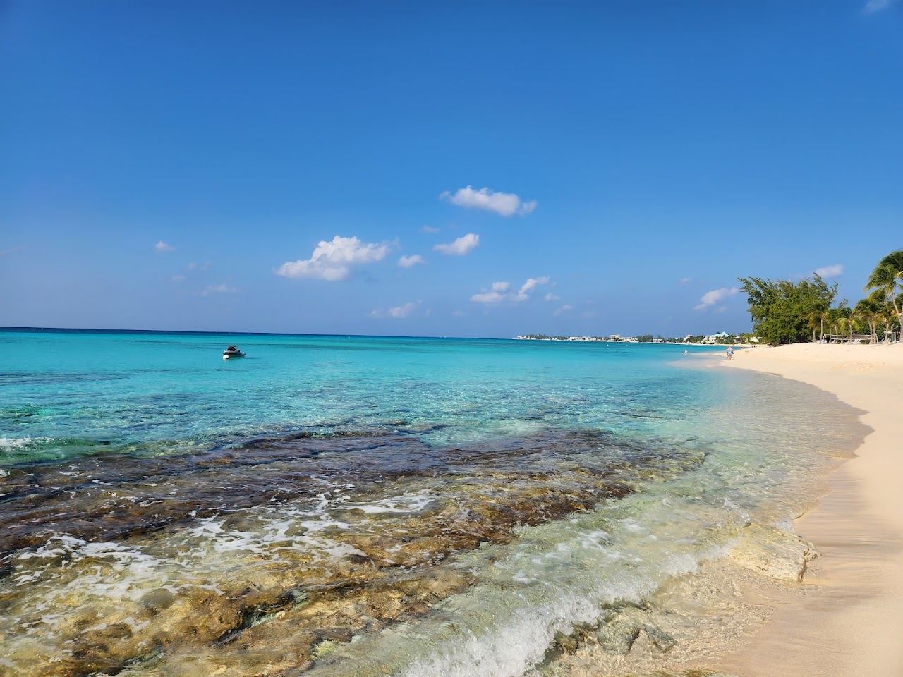 Powdery white sand and calm clear water at the quiet northern Cemetery Beach end of Seven Mile Beach Grand Cayman