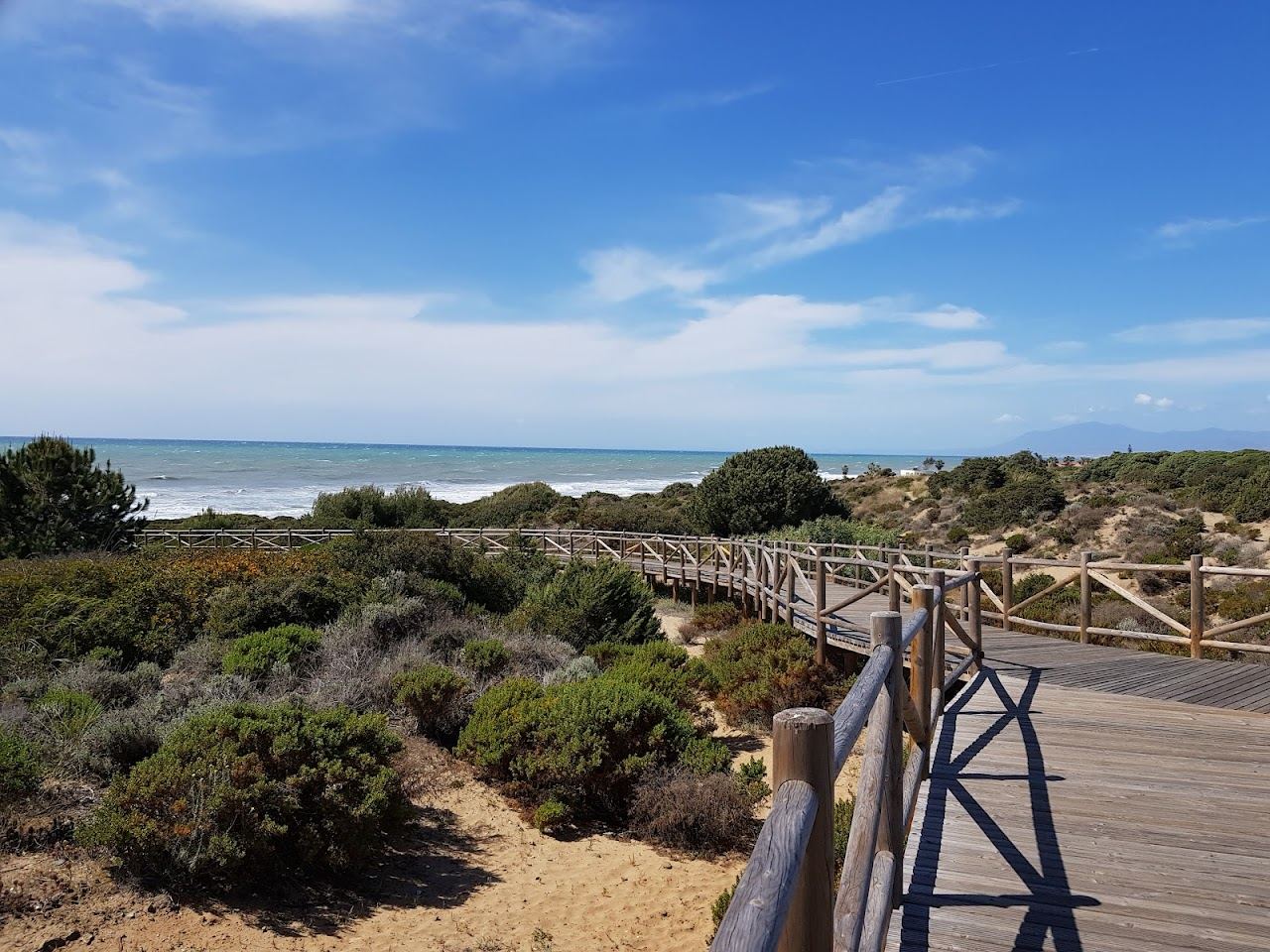 Late afternoon light over the dunes and open sand at Cabopino on the Costa del Sol