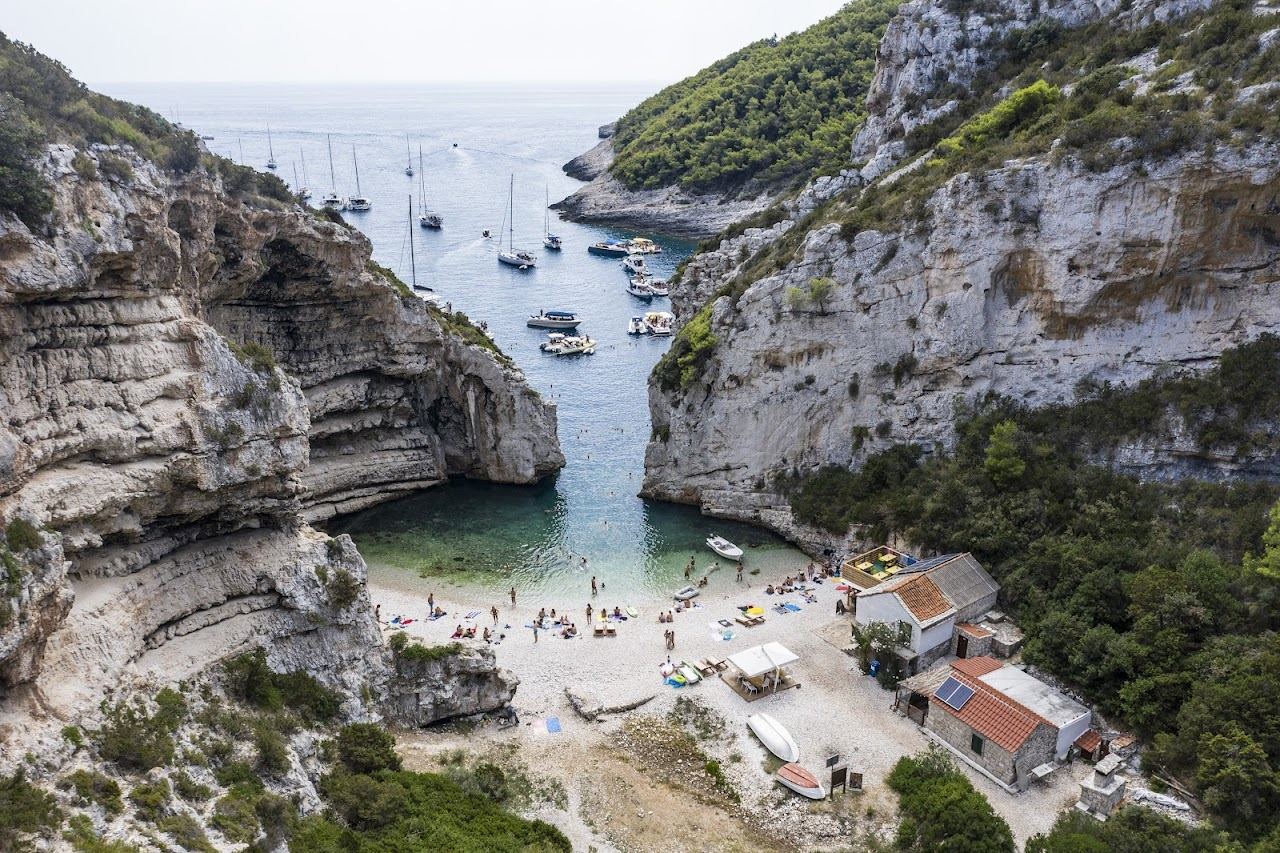 The narrow cliff framed cove of Stiniva beach on Vis