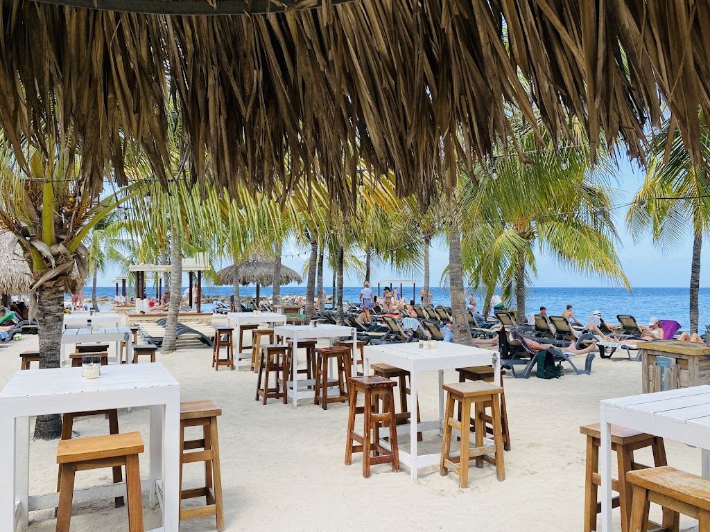 Beachfront tables and bar at Zanzibar Beach and Restaurant on Jan Thiel Beach in Curacao