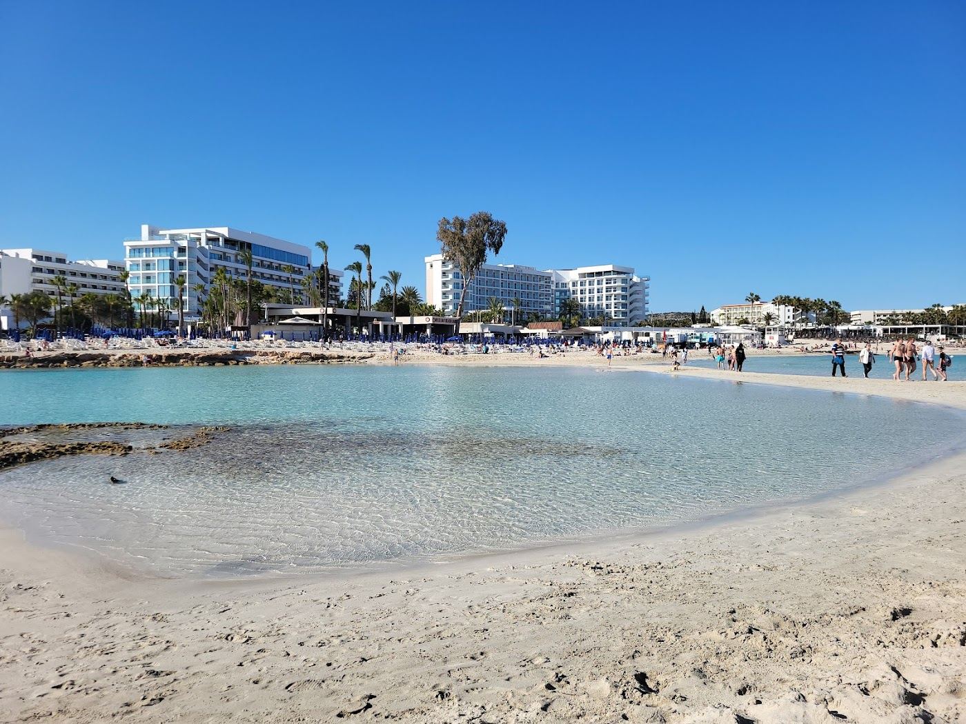 White sand and shallow turquoise water at Nissi Beach in Ayia Napa Cyprus