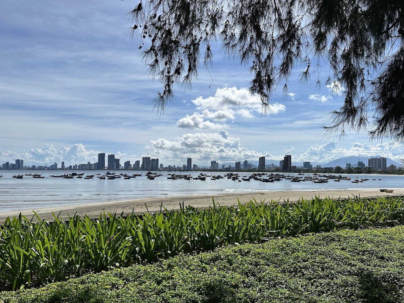 Da Nang beach and the Son Tra peninsula under summer sky in Vietnam