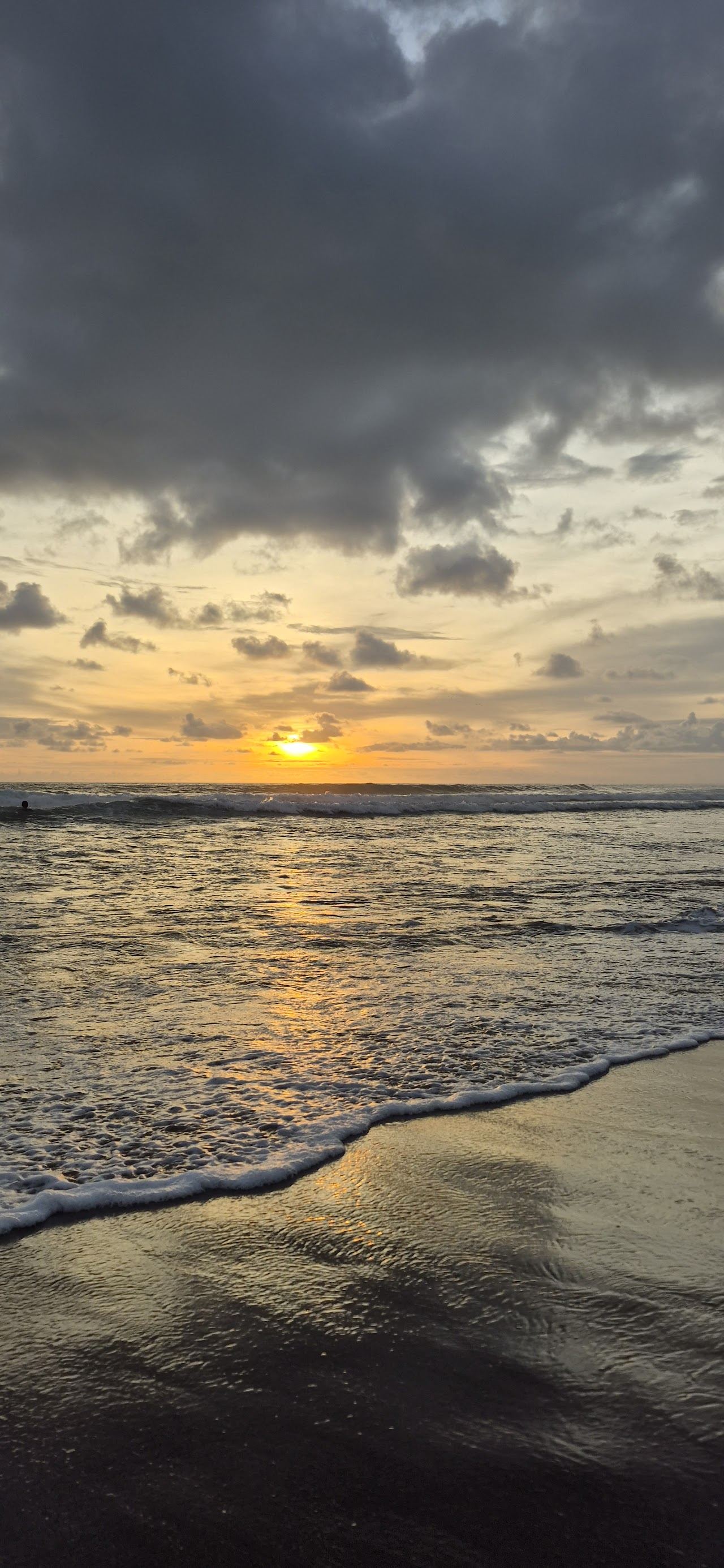 A surf beach backed by cafes and coworking at Echo Beach and Batu Bolong in Canggu Bali