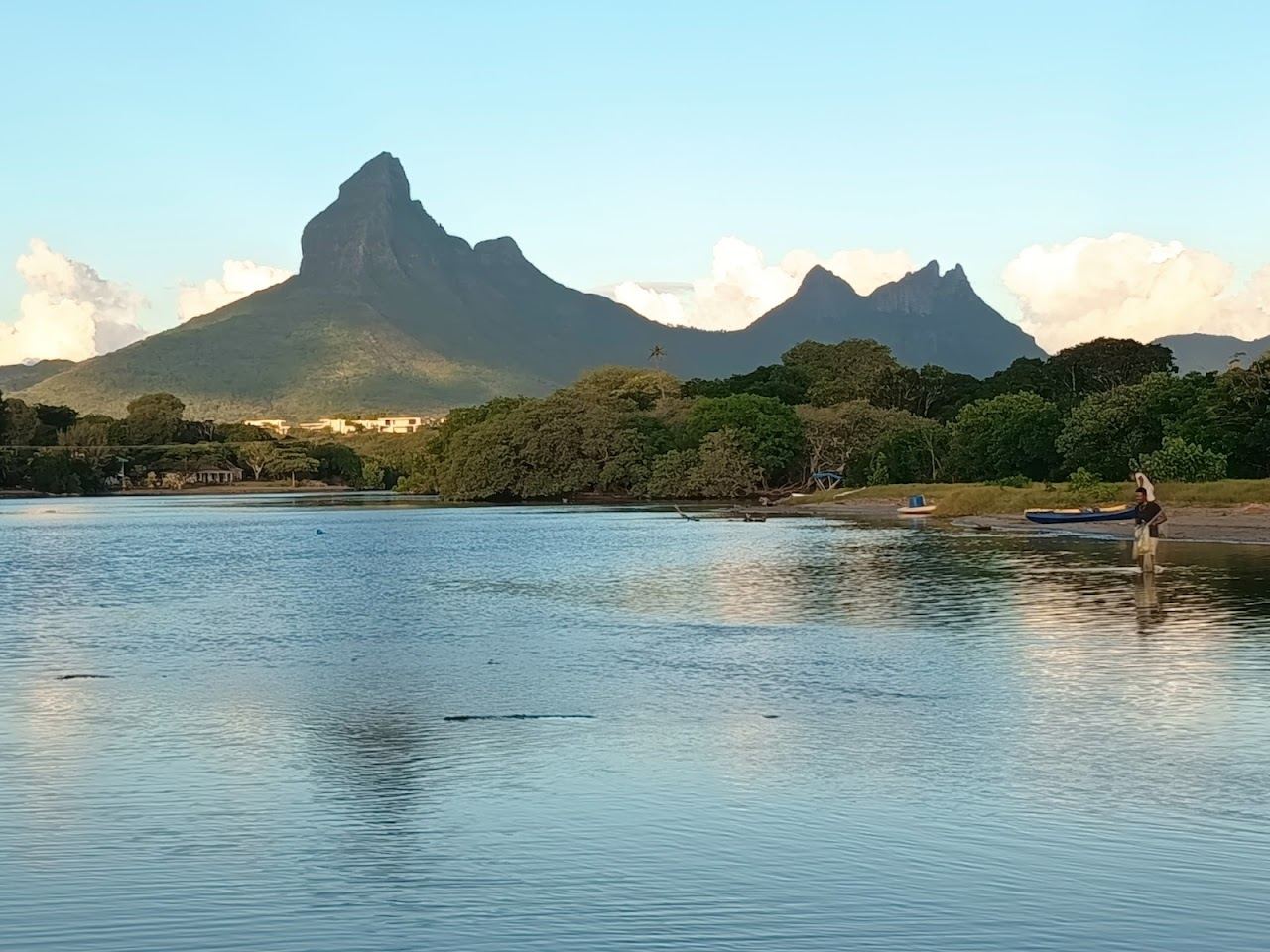 A relaxed surf and lagoon beach with cafes at Tamarin on the west coast of Mauritius