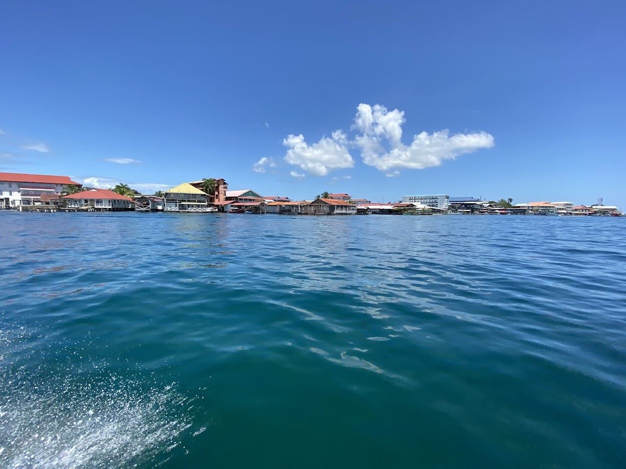 A laid back palm fringed Caribbean beach near the cafes of Bocas del Toro in Panama