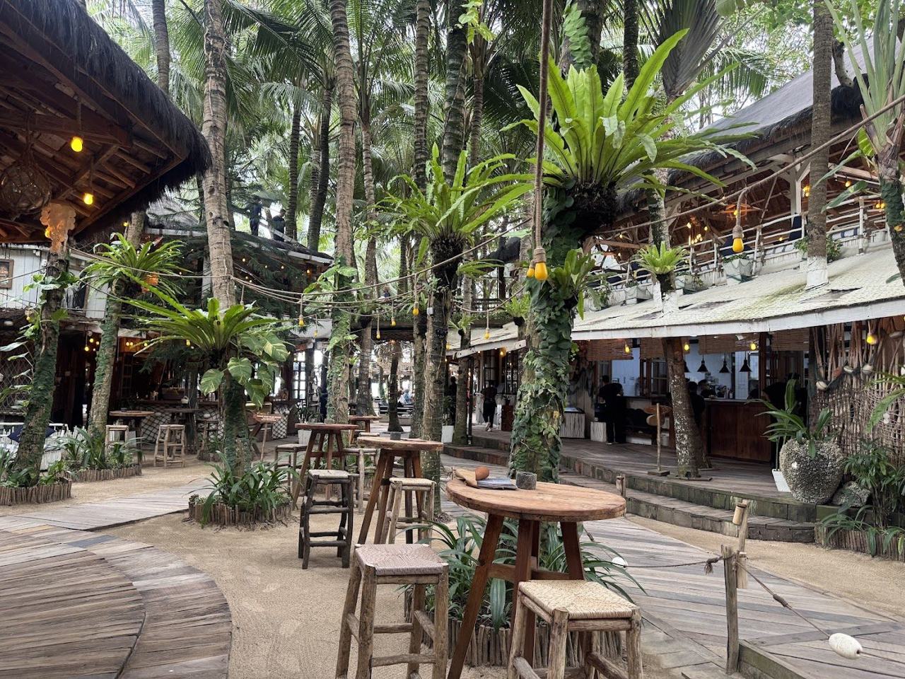 Driftwood terraces and pool at La Brisa beach club above Echo Beach in Canggu