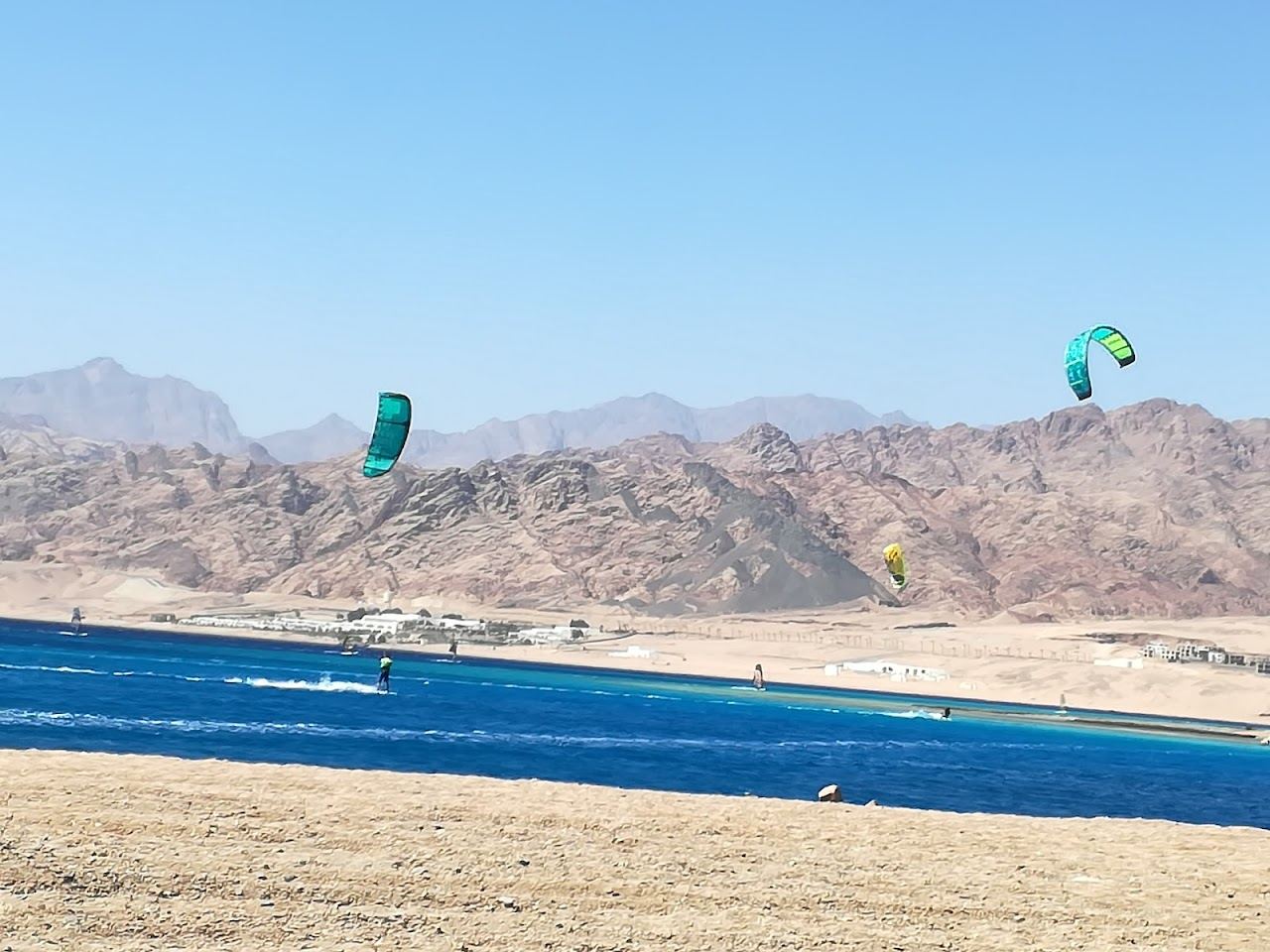 The turquoise lagoon and windsurfers at Dahab