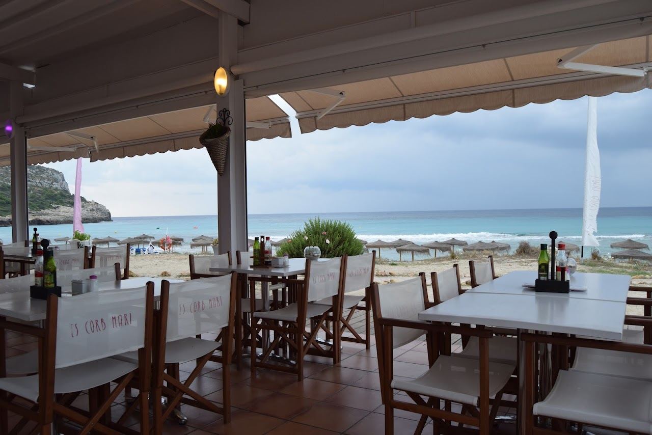 The beachfront terrace of Xiringuito Es Corb Mari on the sand of Son Bou in Menorca