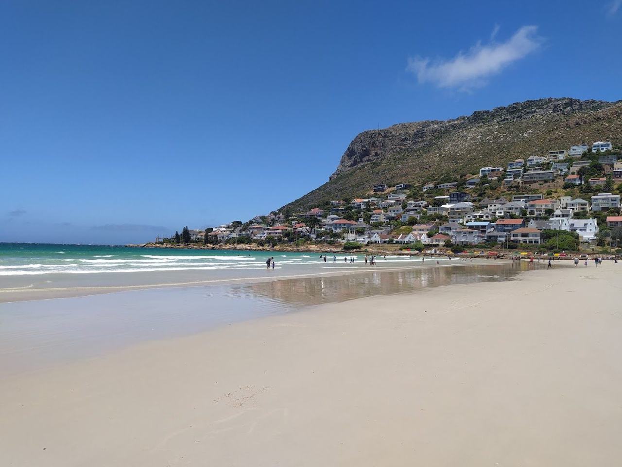 The wide calm sand of Fish Hoek beach on False Bay near Muizenberg in Cape Town