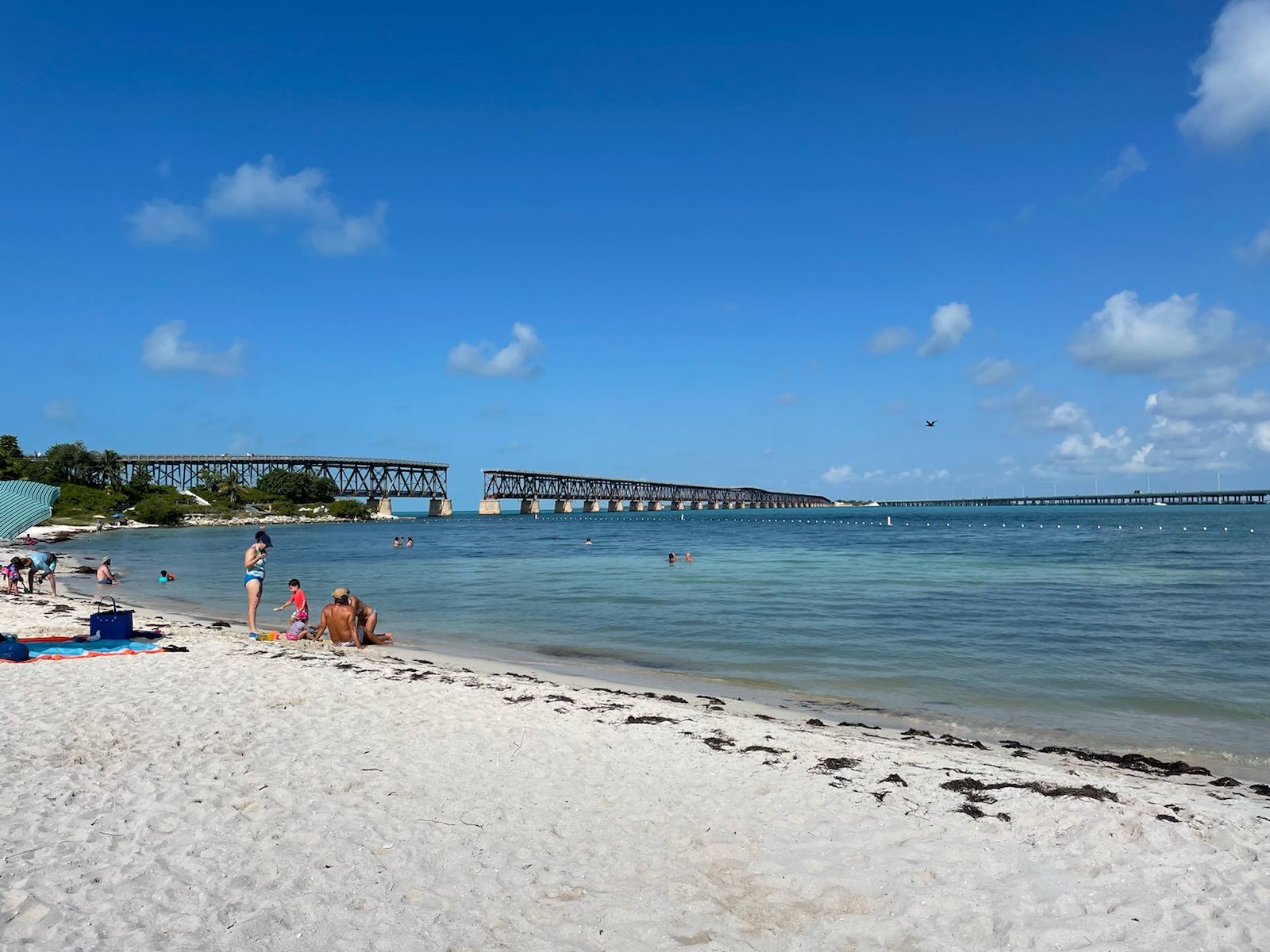 The wide natural sand and clear turquoise water of Bahia Honda State Park beach in the Florida Keys
