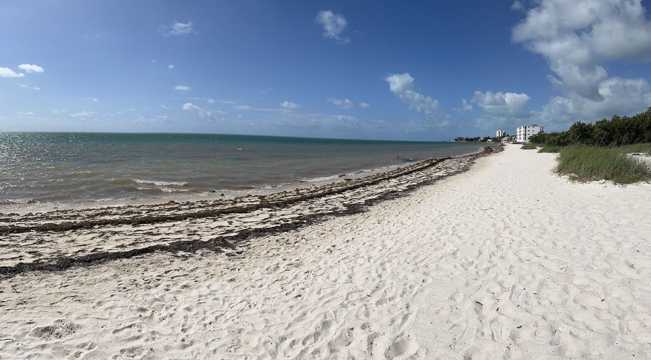 Shallow calm water and natural sand at a Florida Keys family beach in Marathon