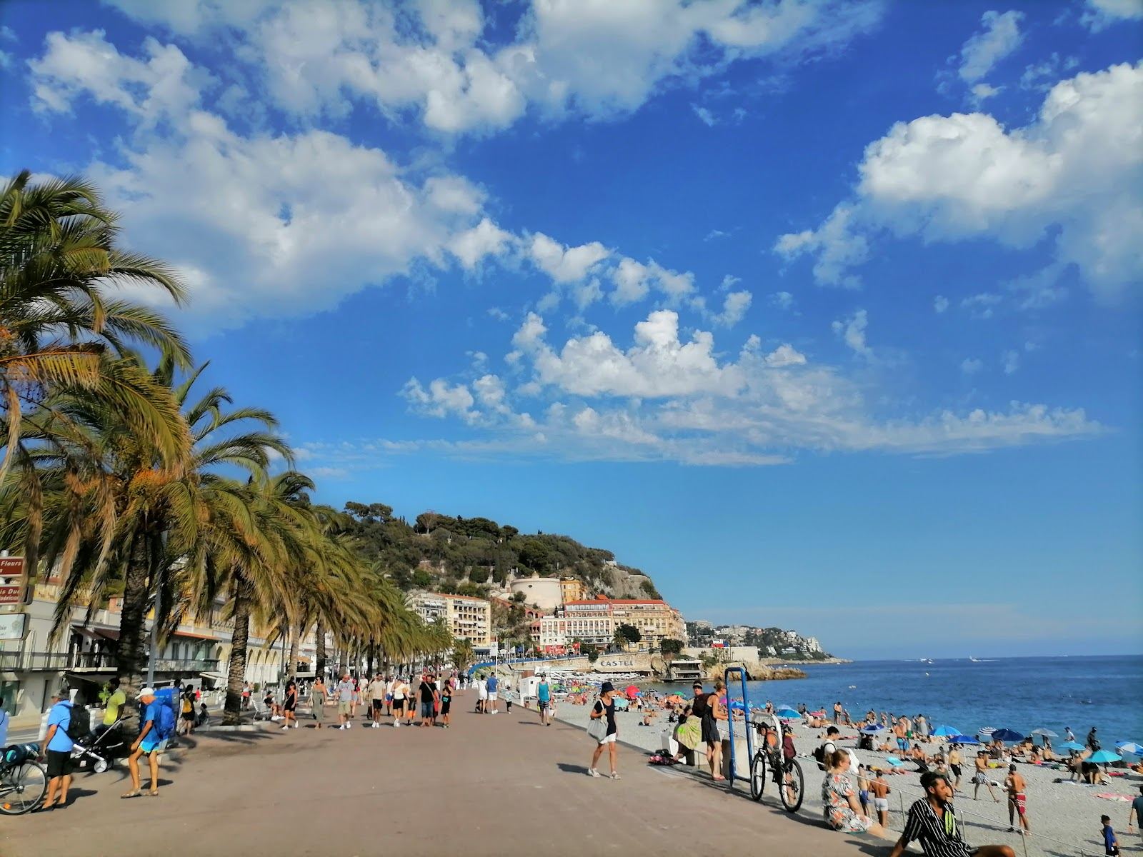 Pebble beach and promenade along the Baie des Anges at Nice on the French Riviera