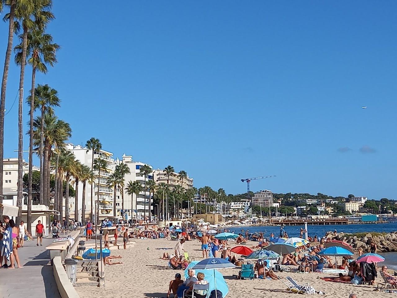 The sandy bay and calm water at Juan les Pins near Antibes on the French Riviera