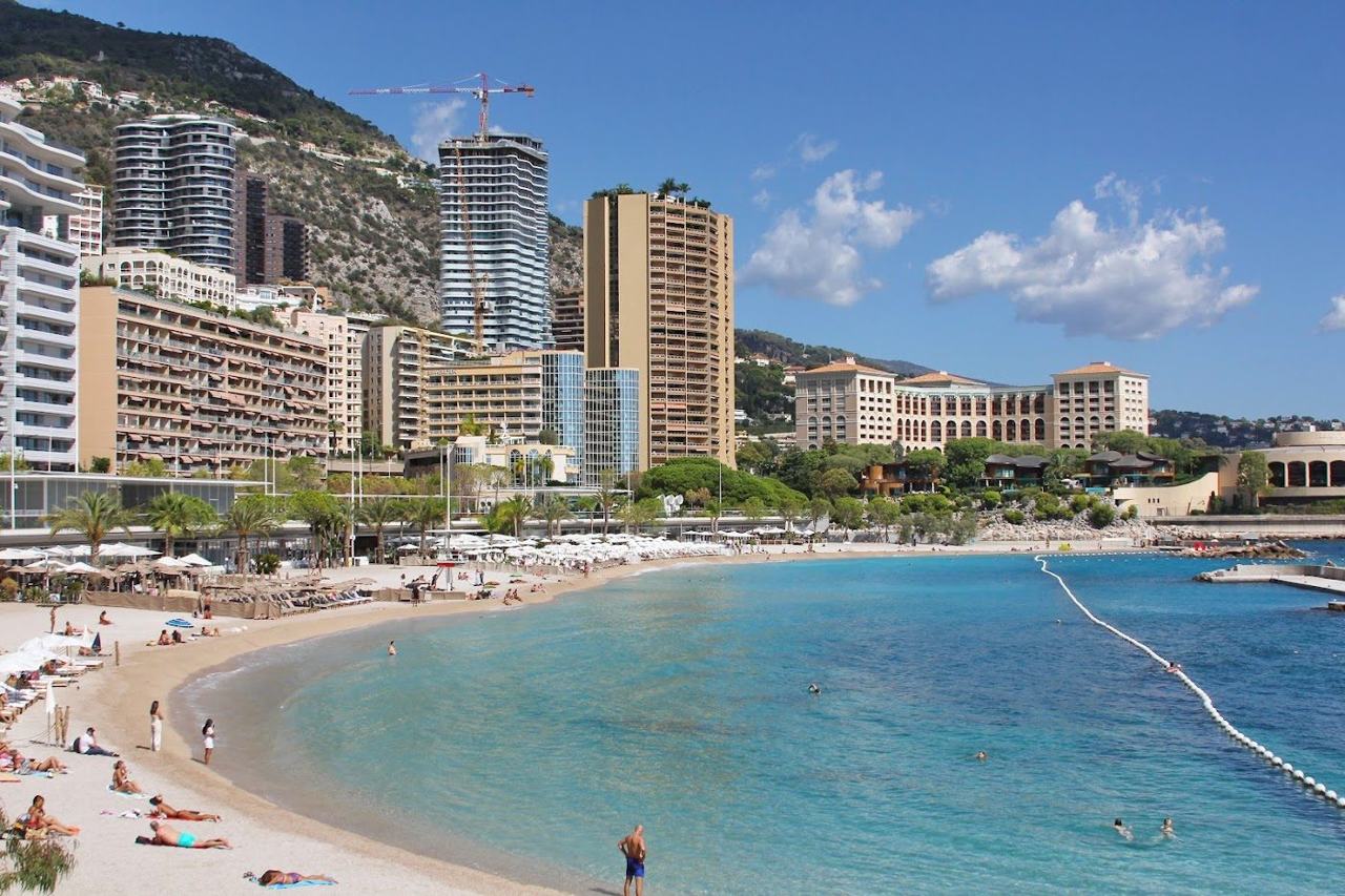 The supervised beach and clear water at Larvotto in Monaco on the French Riviera