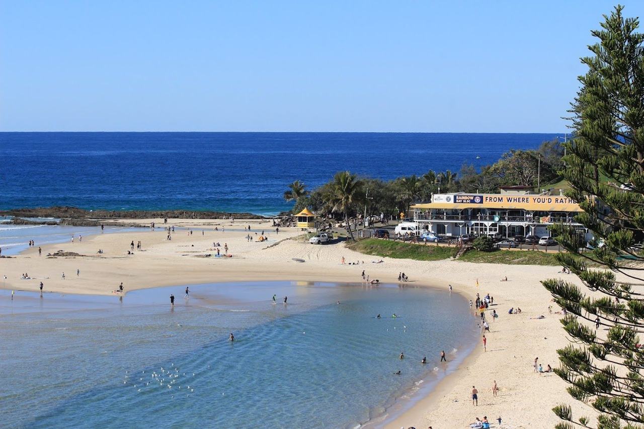 The small sheltered cove at Rainbow Bay beside Snapper Rocks
