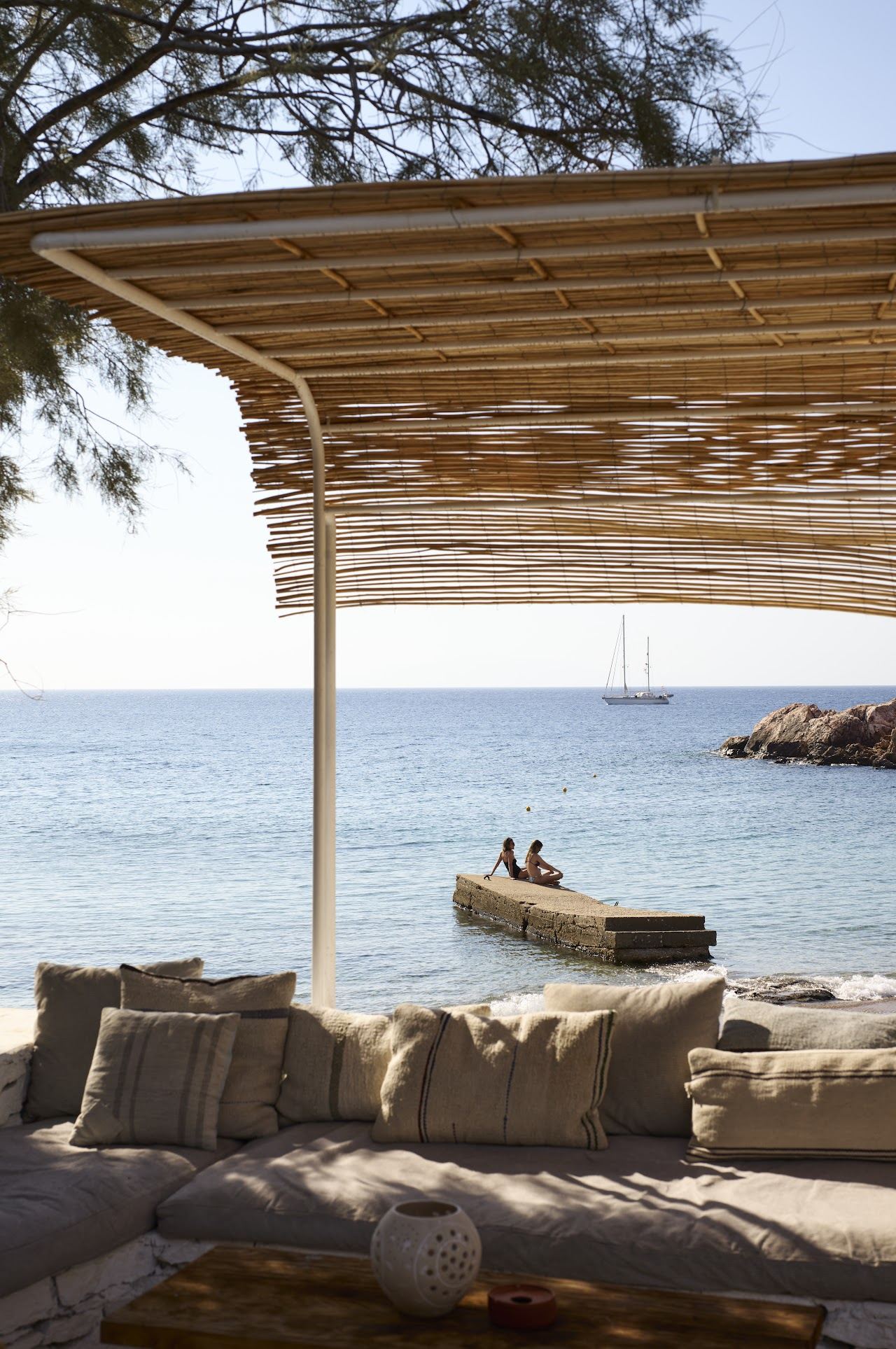 A laid back stylish beach club beside calm Cycladic water at The Beach House on Antiparos