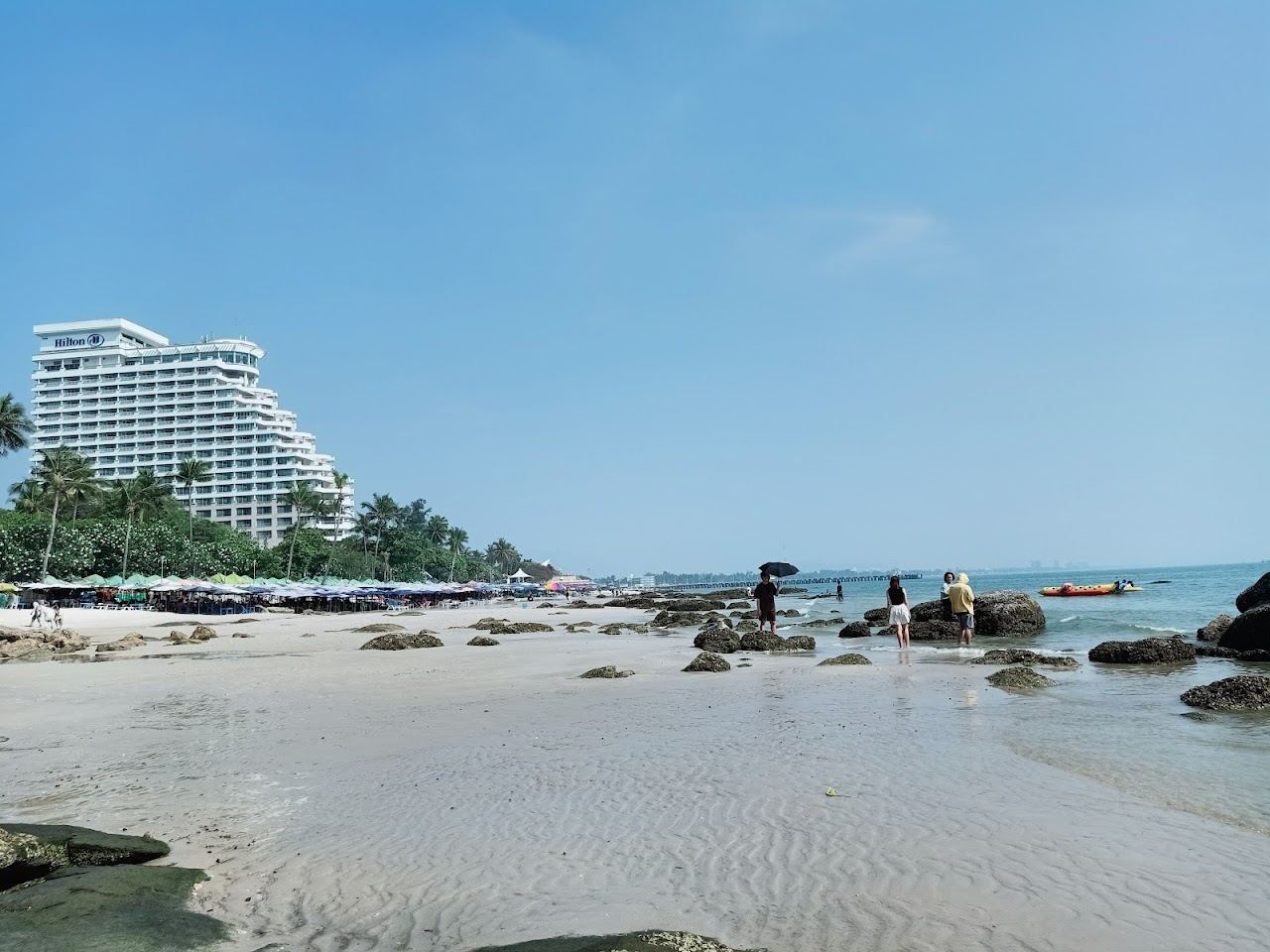 The long sweep of Hua Hin Beach and the gulf shore in Thailand