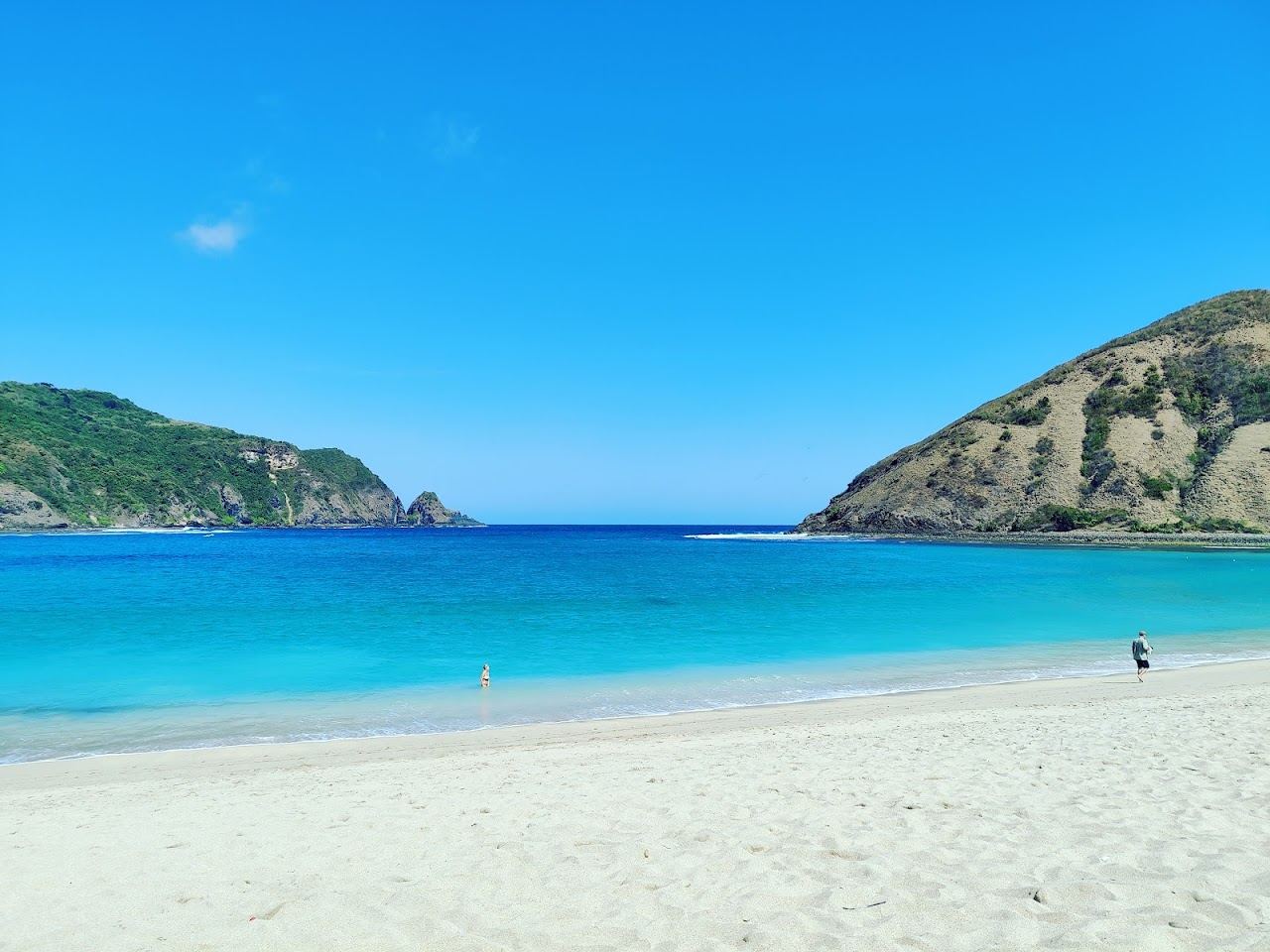 The quiet crescent of Mawun Beach on Lombok