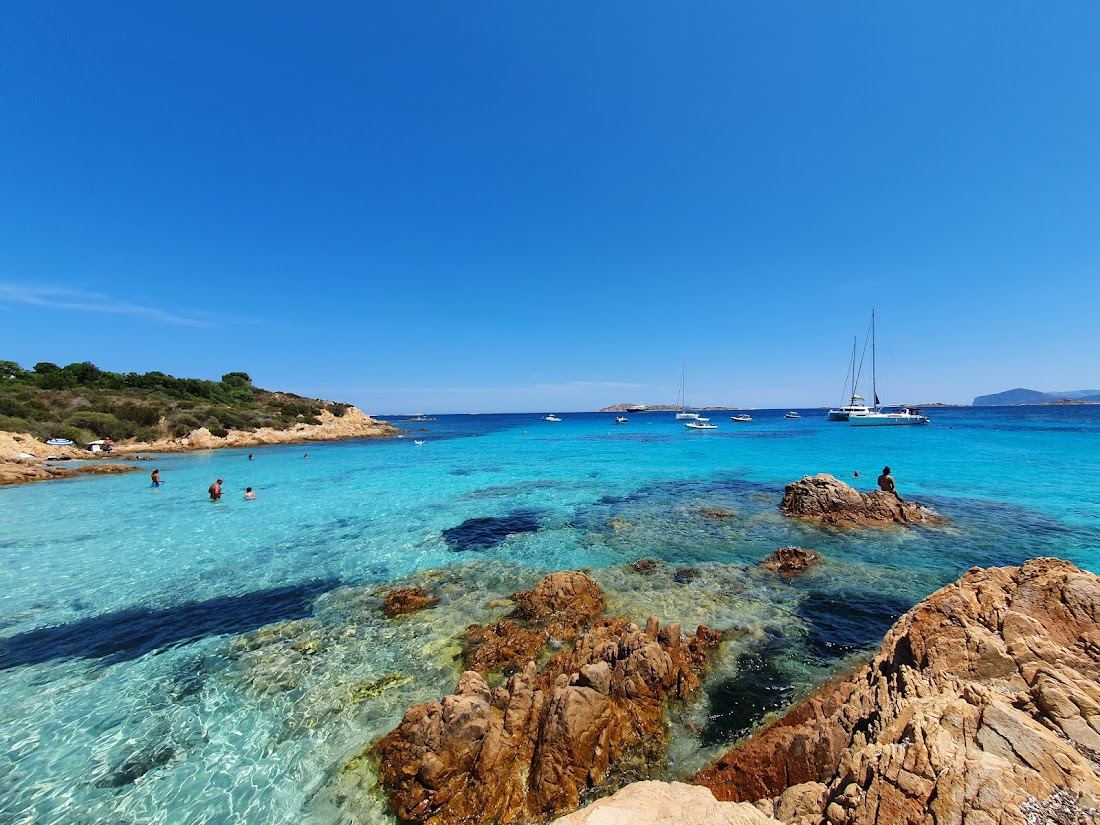 Spiaggia del Principe in Costa Smeralda, Sardinia with clear water and sand