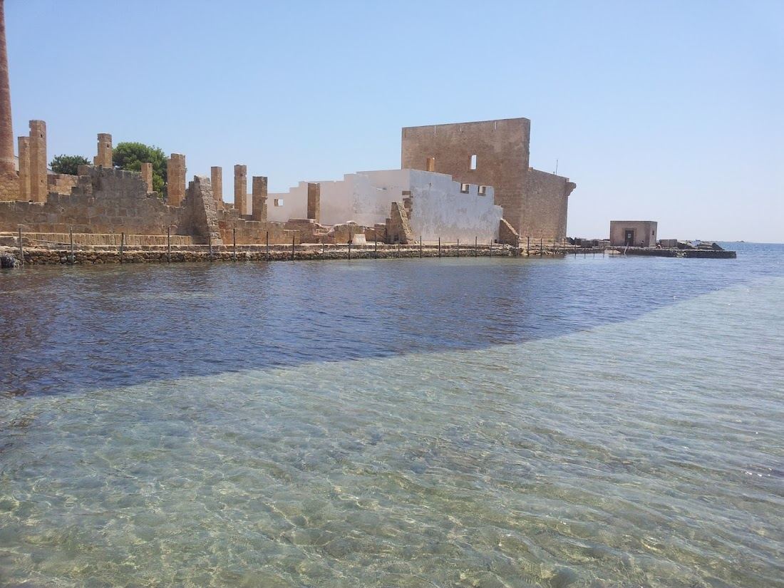 Vendicari in Noto, Sicily with clear water and sand