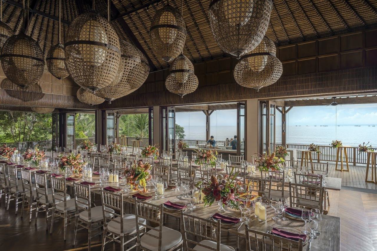 Long beachfront pool and daybeds at Sundara beach club in Jimbaran Bali