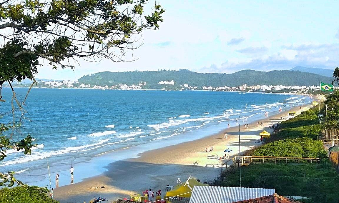 The calm north shore water and smart frontage of Jurere Internacional in Florianopolis