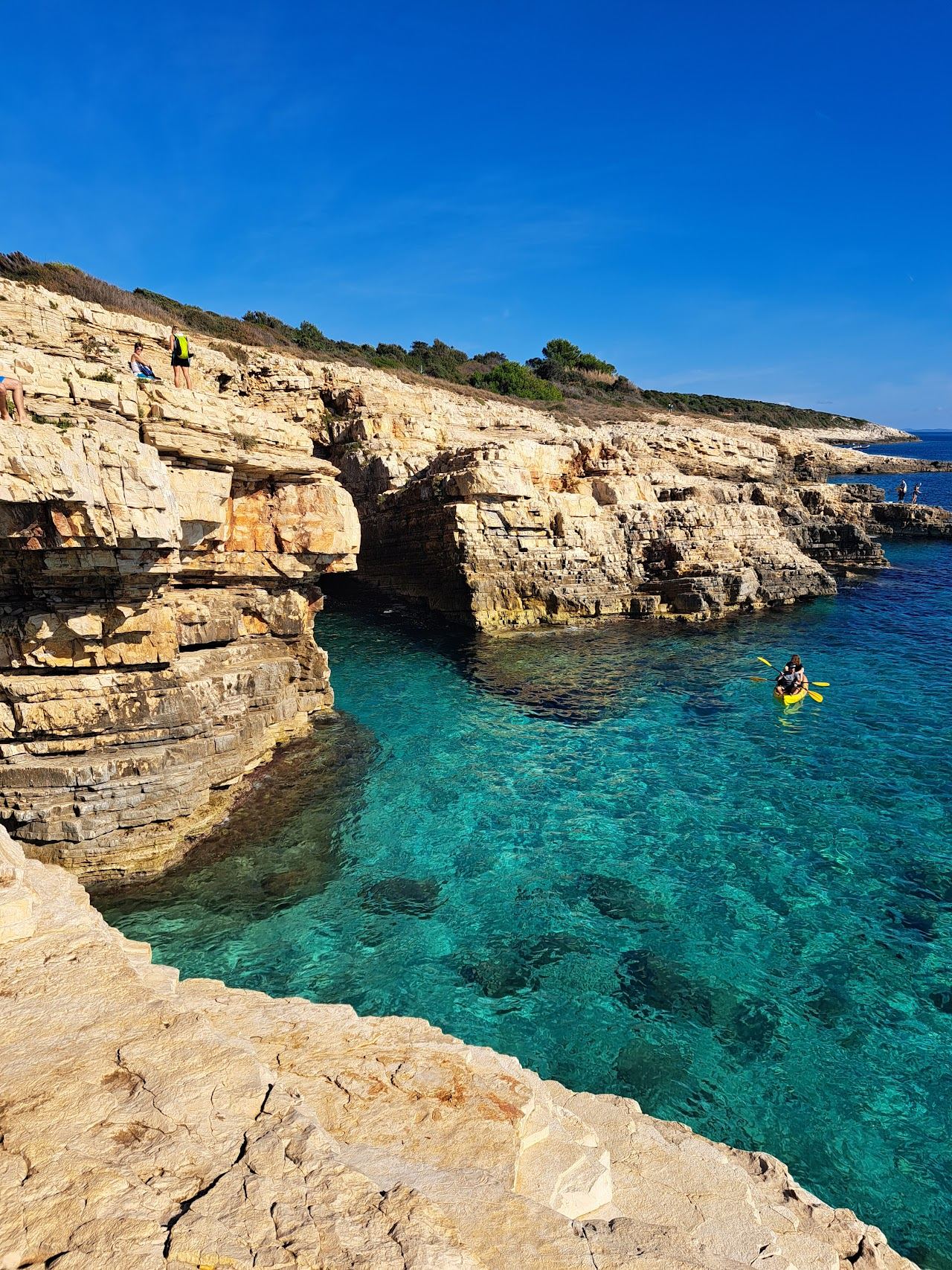 Clear water and white rock coves in the Kamenjak nature park near Premantura in Istria