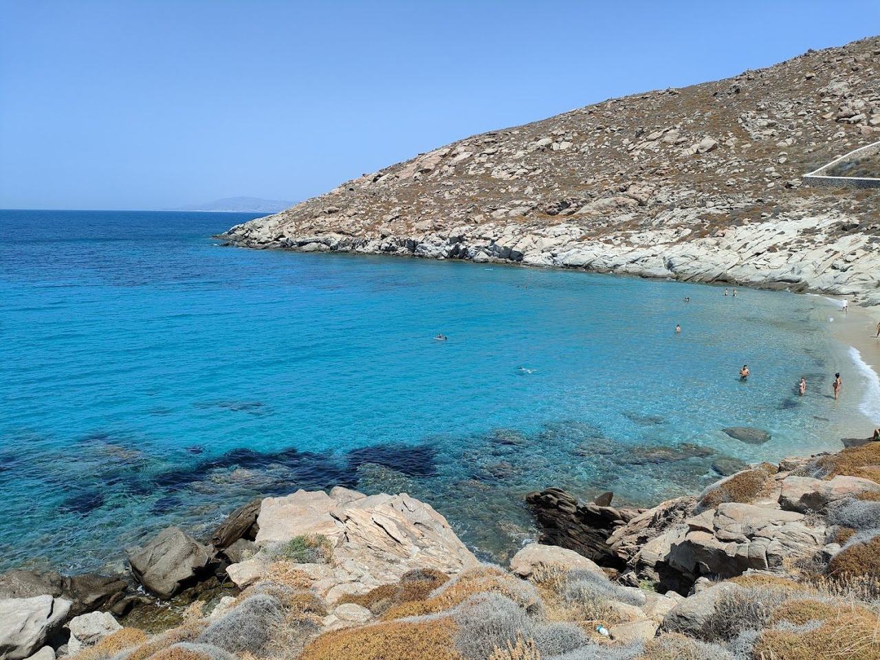 The small unorganised cove of Kapari Beach near Agios Ioannis on the southwest of Mykonos with clear water