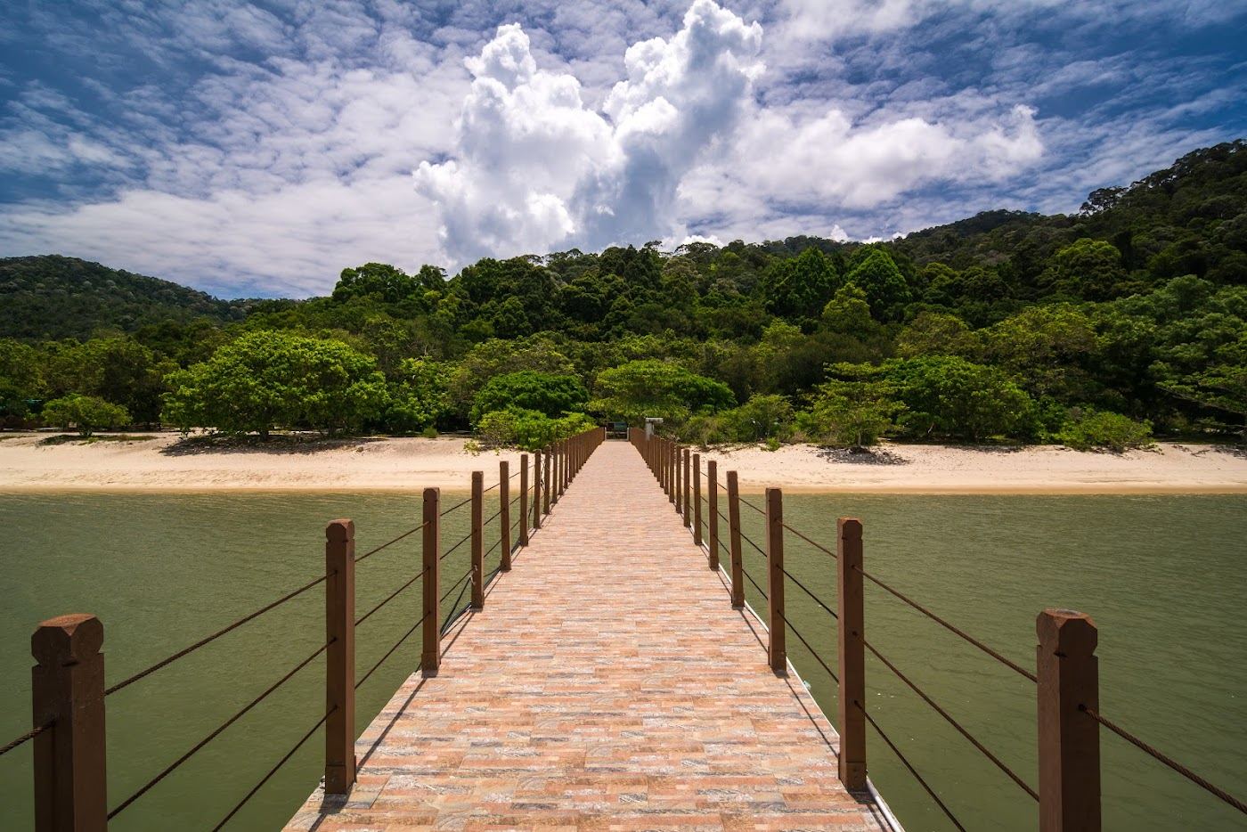 The quiet white sand and forest at Kerachut Beach in Penang National Park