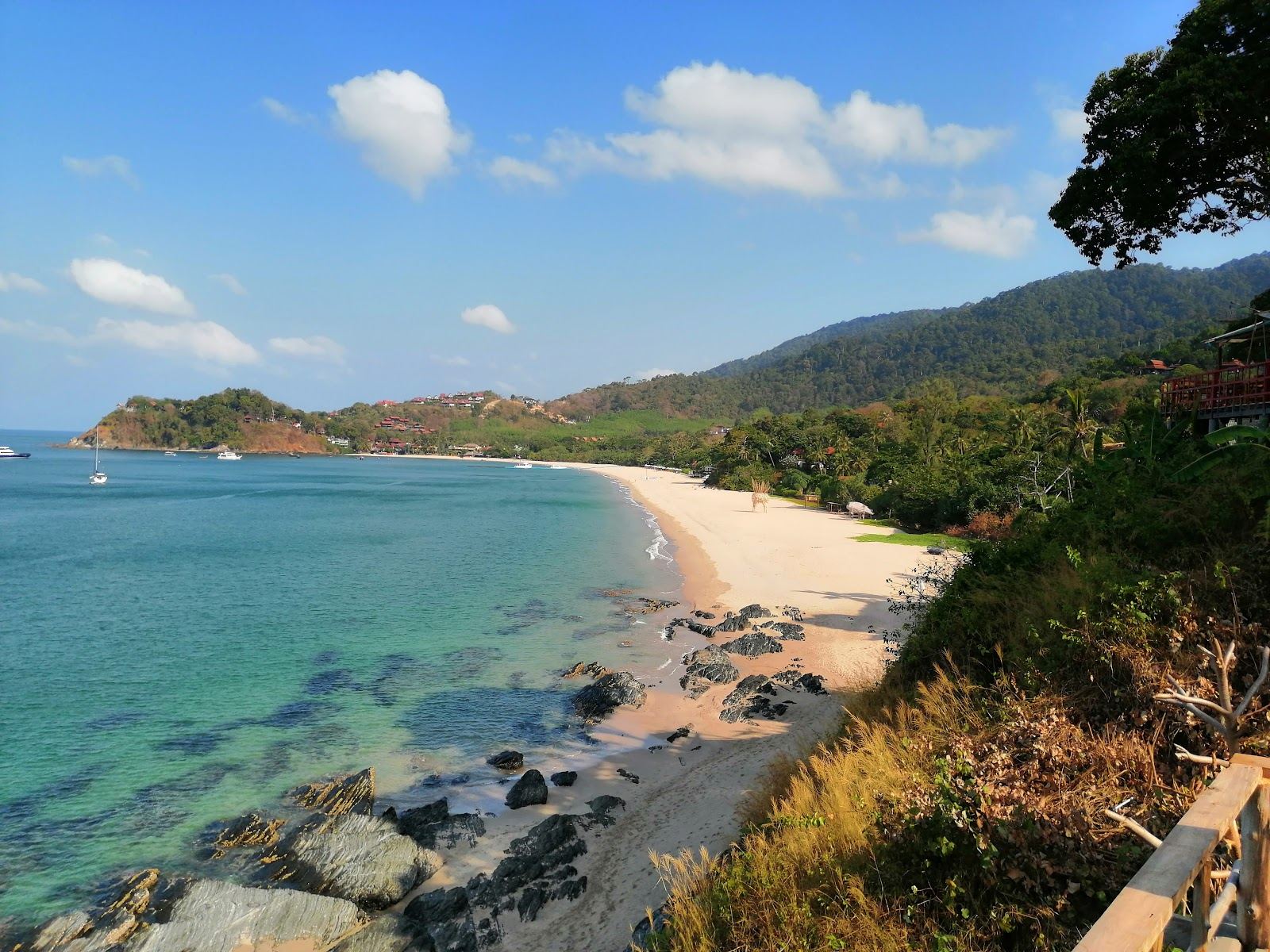 The soft golden crescent and calm clear water of Kantiang Bay in the quiet south of Koh Lanta