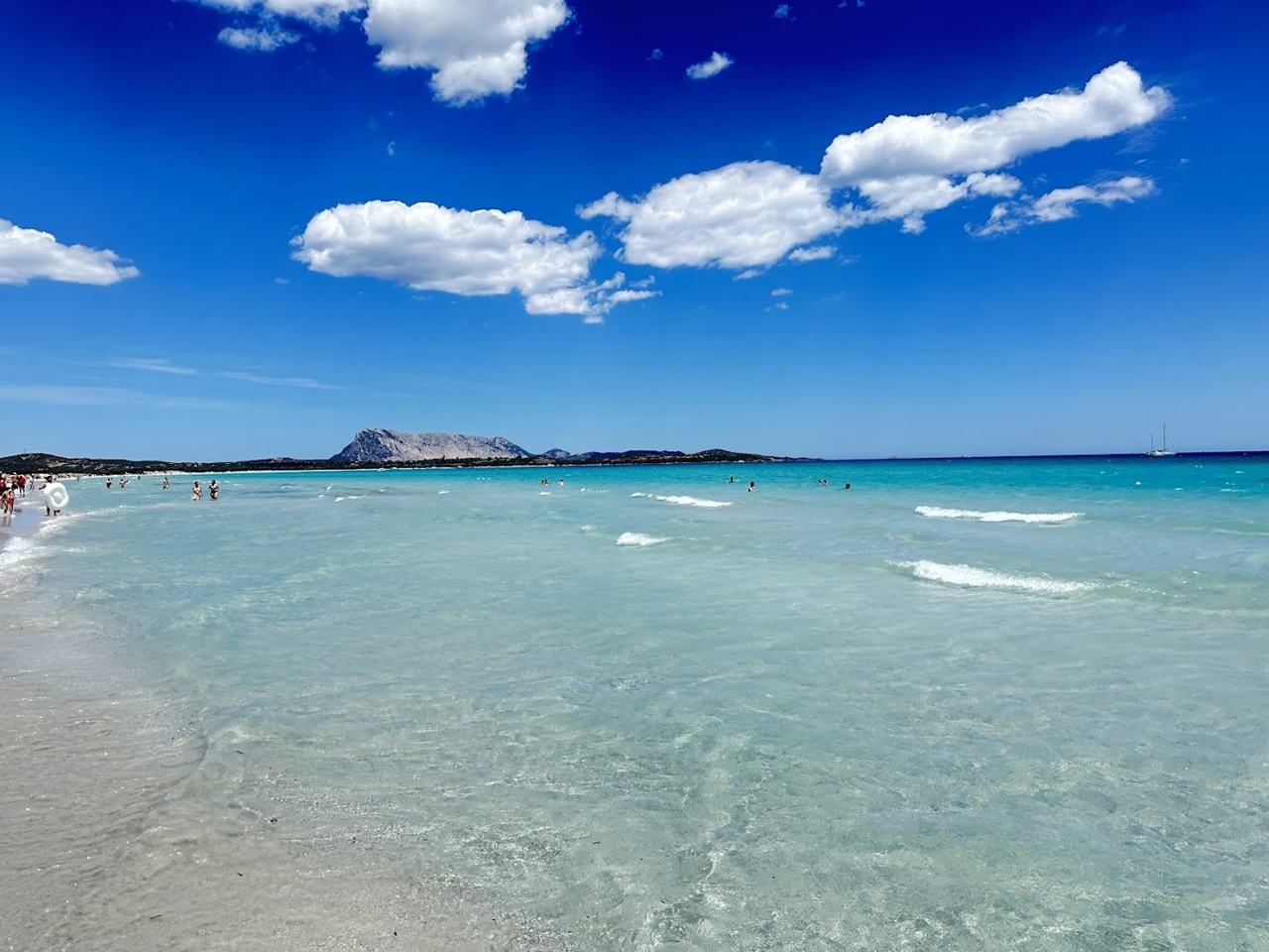 La Cinta long white sand beach and shallow turquoise water at San Teodoro Sardinia