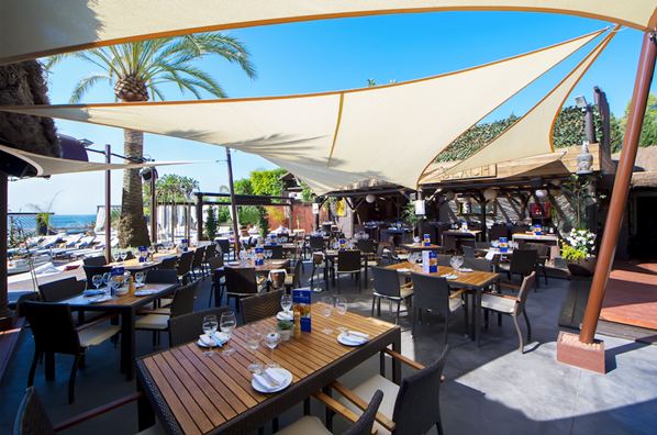 Pool and Thai styled beds at La Sala by the Sea on Puerto Banus beach in Marbella